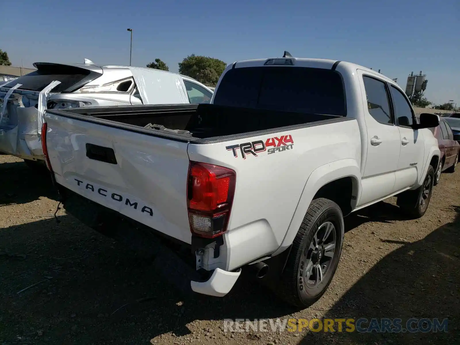 4 Photograph of a damaged car 3TMCZ5AN8KM214129 TOYOTA TACOMA 2019