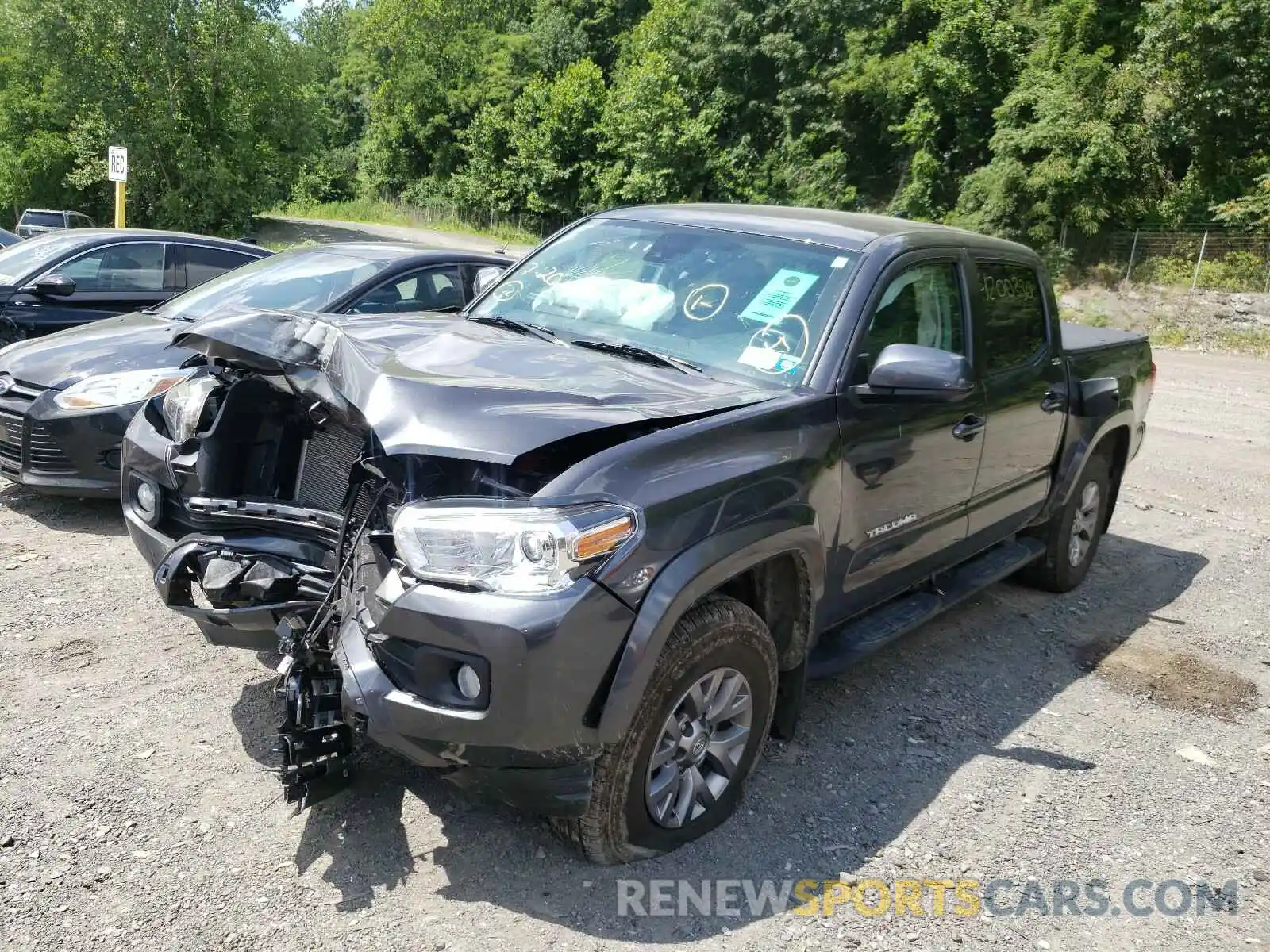 2 Photograph of a damaged car 3TMCZ5AN8KM214213 TOYOTA TACOMA 2019