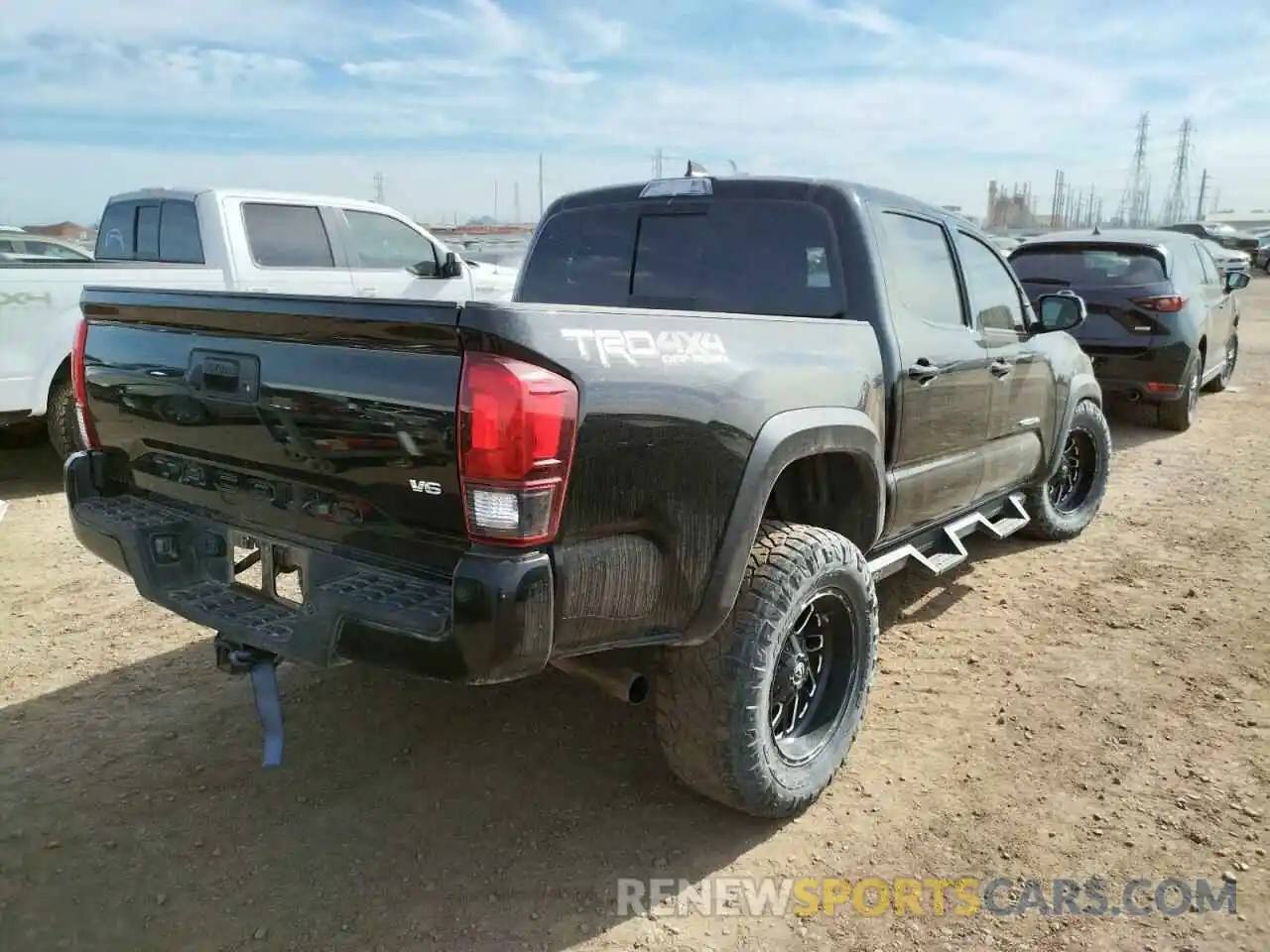 4 Photograph of a damaged car 3TMCZ5AN8KM214227 TOYOTA TACOMA 2019