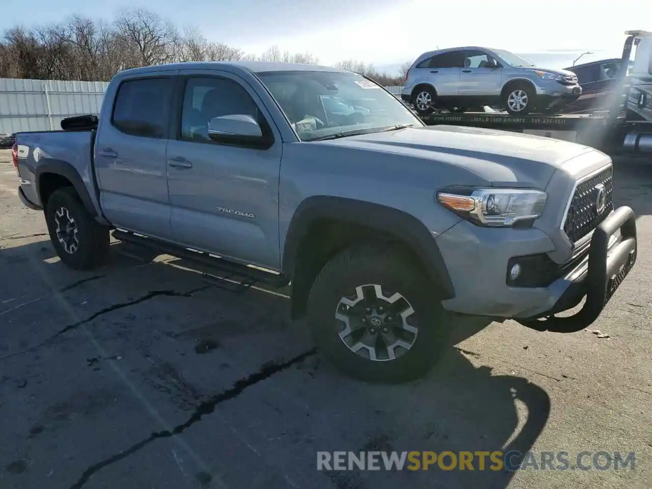 4 Photograph of a damaged car 3TMCZ5AN8KM214230 TOYOTA TACOMA 2019