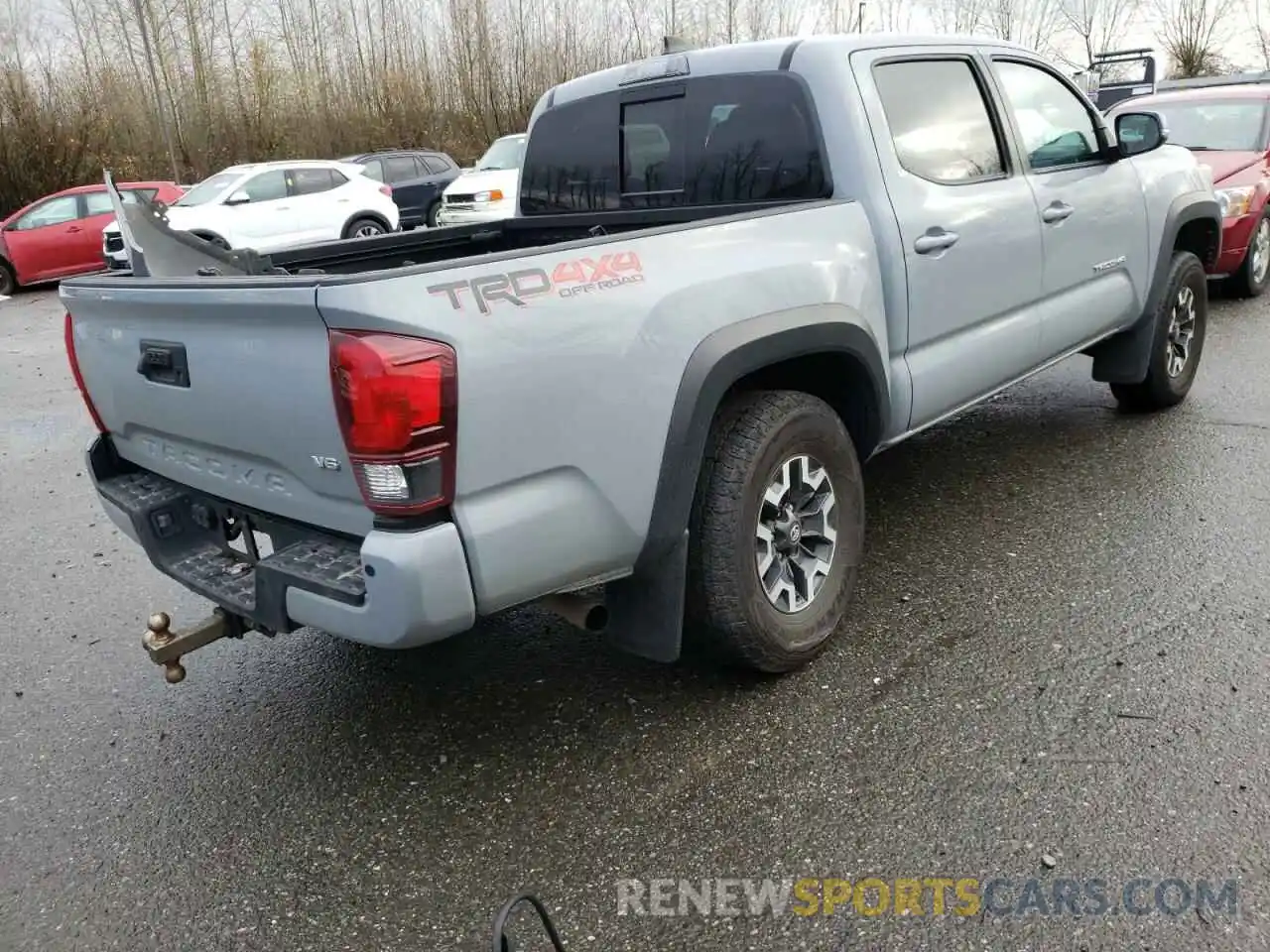 4 Photograph of a damaged car 3TMCZ5AN8KM221954 TOYOTA TACOMA 2019