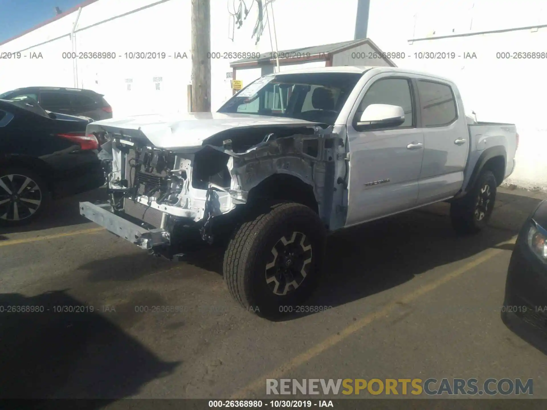 2 Photograph of a damaged car 3TMCZ5AN8KM227351 TOYOTA TACOMA 2019