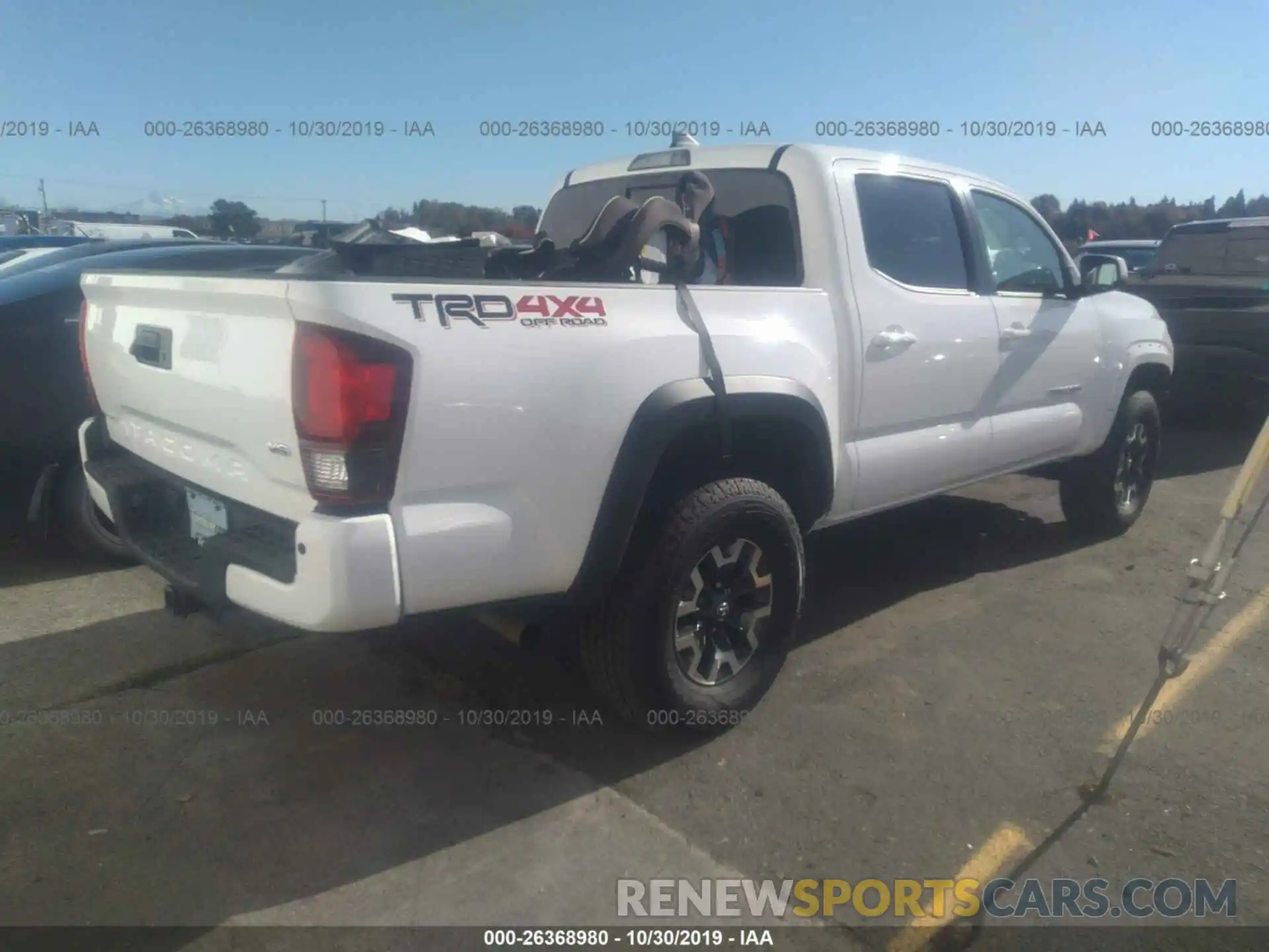 4 Photograph of a damaged car 3TMCZ5AN8KM227351 TOYOTA TACOMA 2019