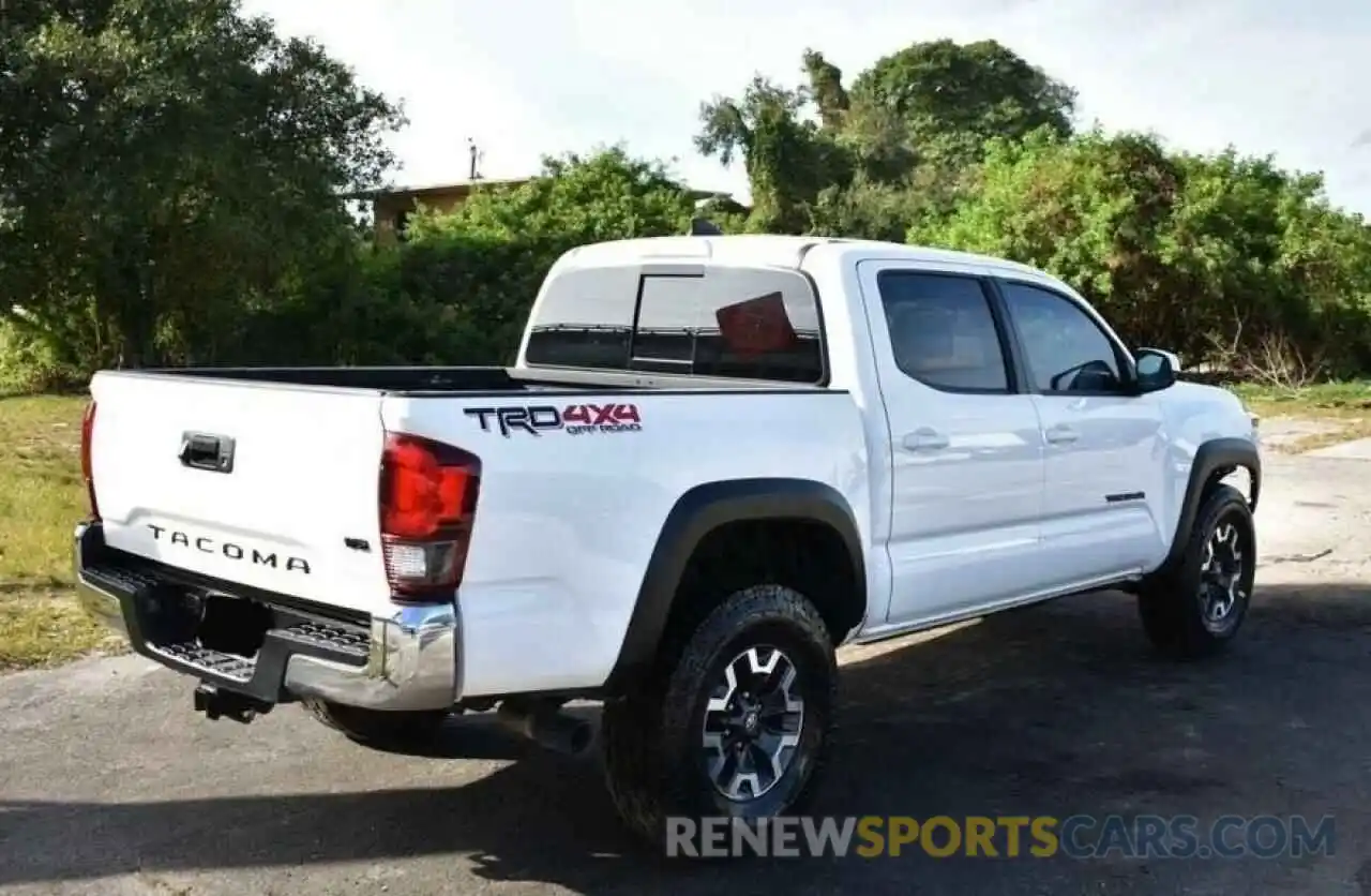 4 Photograph of a damaged car 3TMCZ5AN8KM228922 TOYOTA TACOMA 2019