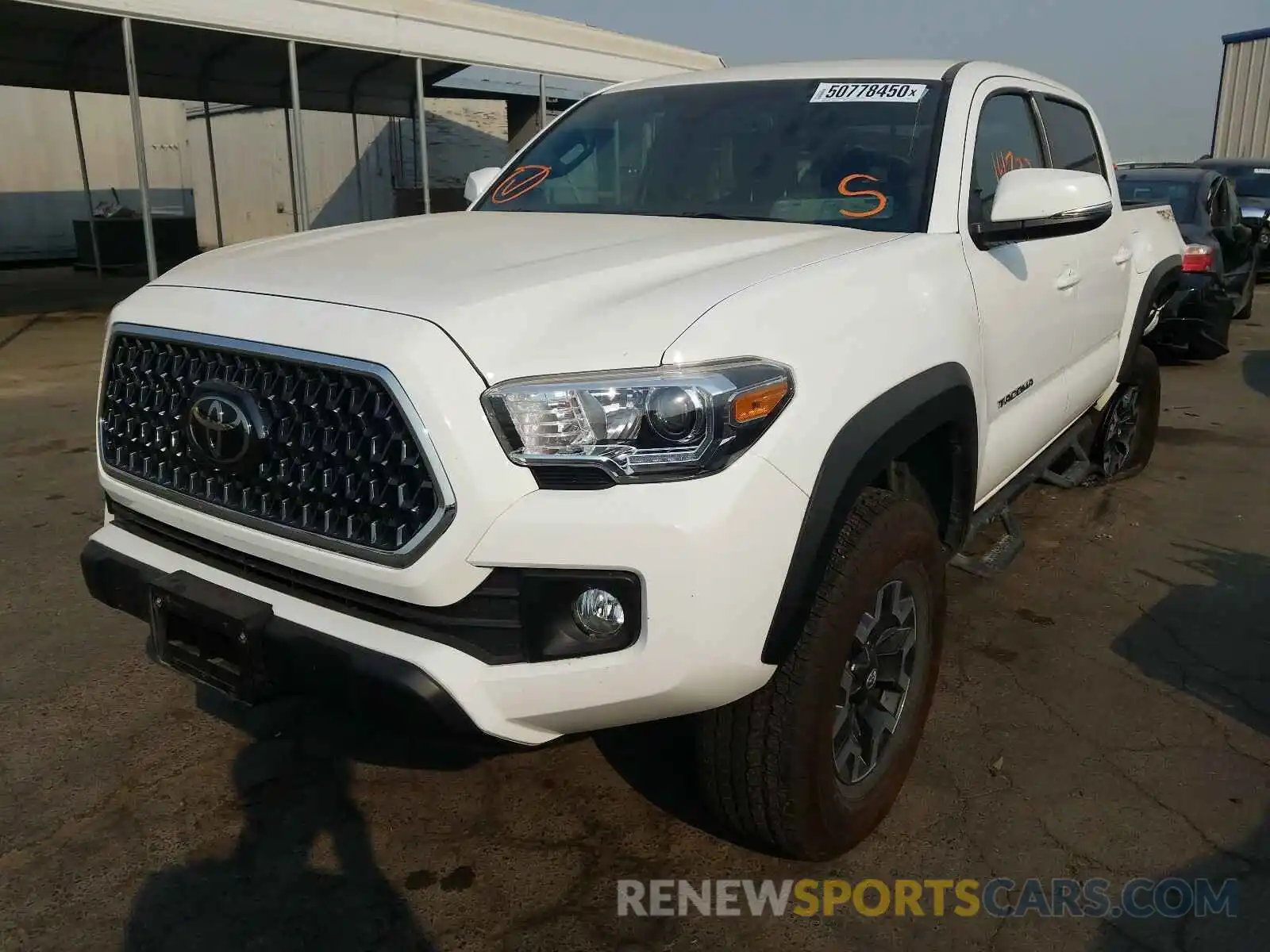 2 Photograph of a damaged car 3TMCZ5AN8KM229584 TOYOTA TACOMA 2019