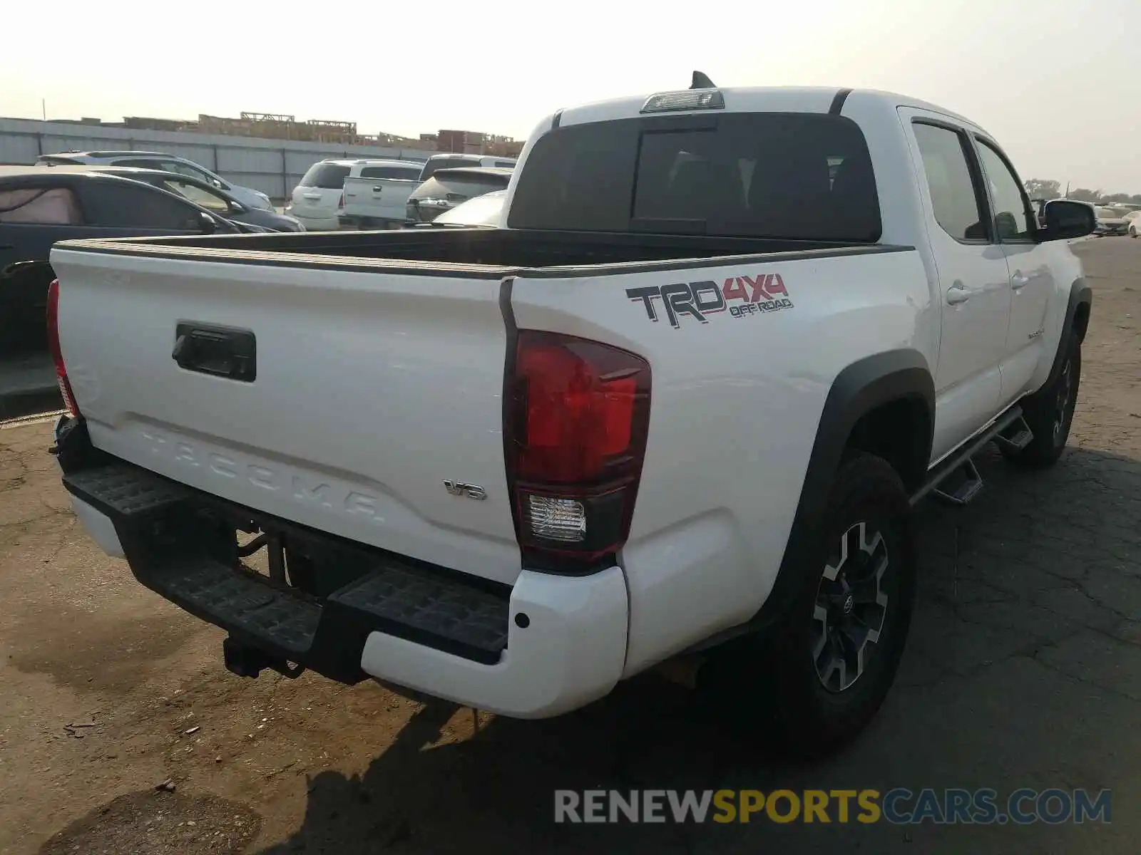 4 Photograph of a damaged car 3TMCZ5AN8KM229584 TOYOTA TACOMA 2019