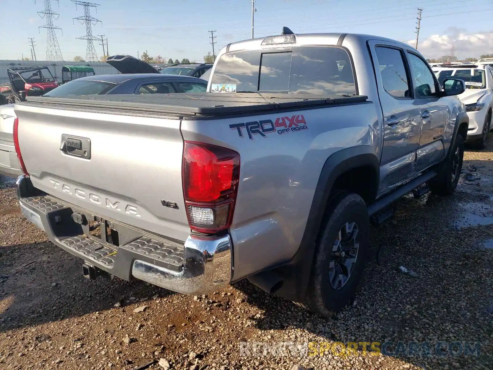 4 Photograph of a damaged car 3TMCZ5AN8KM230752 TOYOTA TACOMA 2019