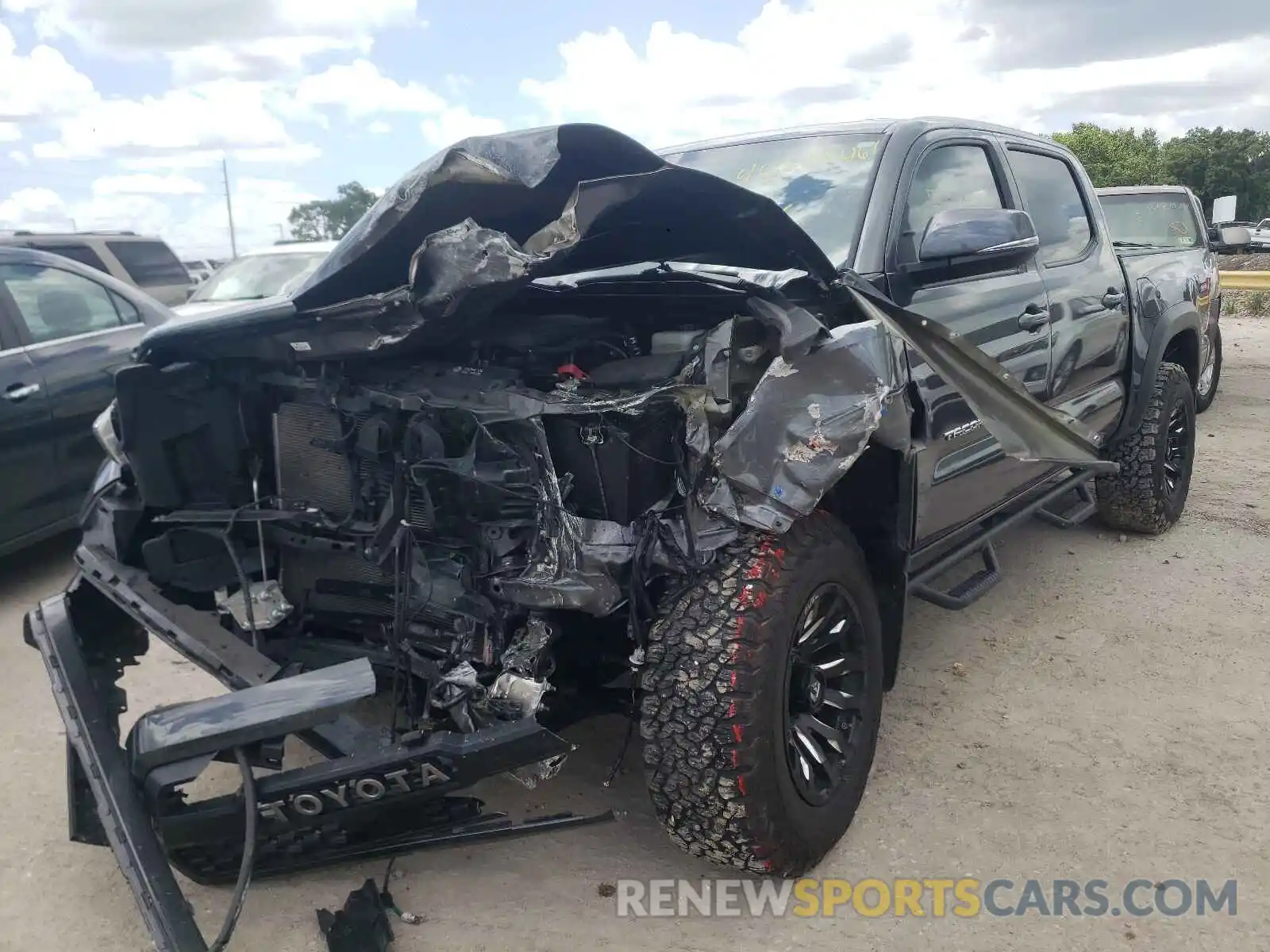 2 Photograph of a damaged car 3TMCZ5AN8KM231058 TOYOTA TACOMA 2019