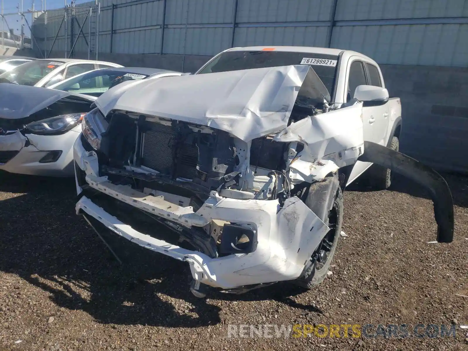 2 Photograph of a damaged car 3TMCZ5AN8KM235563 TOYOTA TACOMA 2019