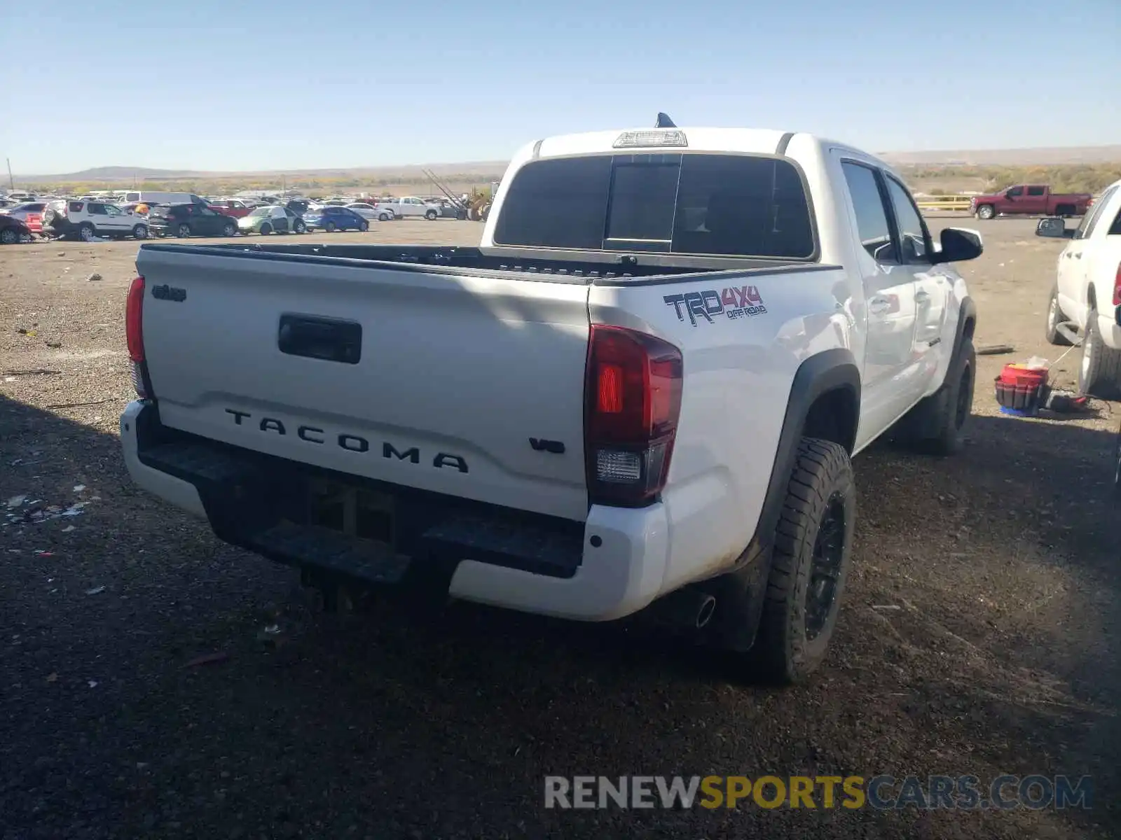 4 Photograph of a damaged car 3TMCZ5AN8KM235563 TOYOTA TACOMA 2019