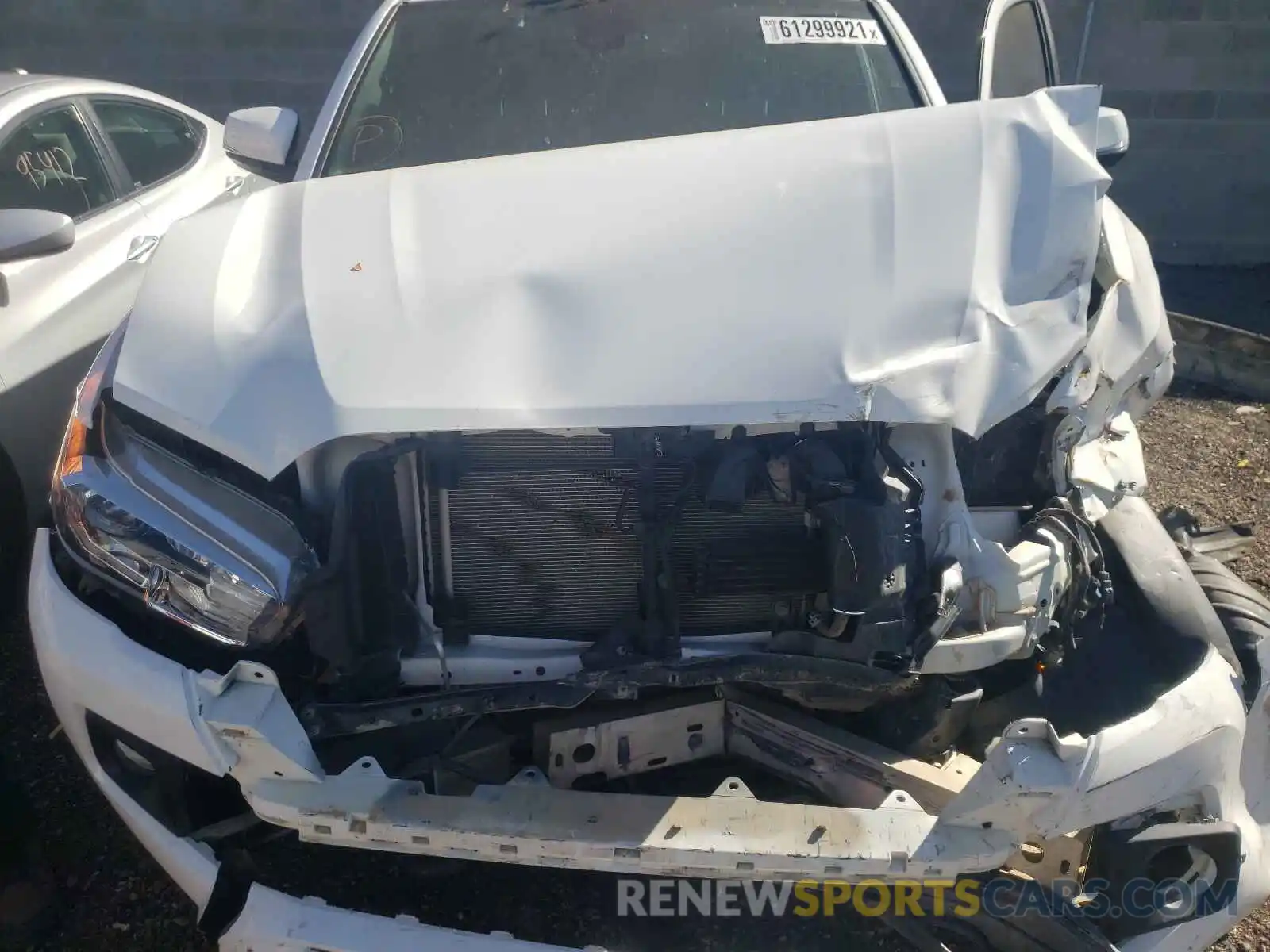 7 Photograph of a damaged car 3TMCZ5AN8KM235563 TOYOTA TACOMA 2019