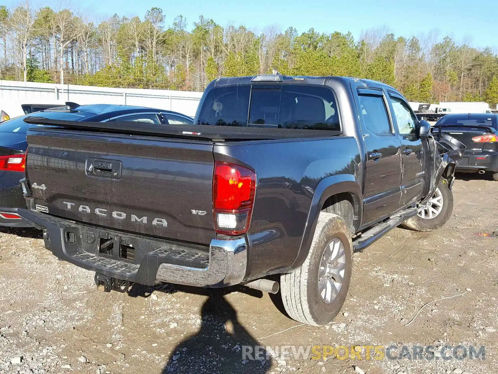 4 Photograph of a damaged car 3TMCZ5AN8KM239709 TOYOTA TACOMA 2019