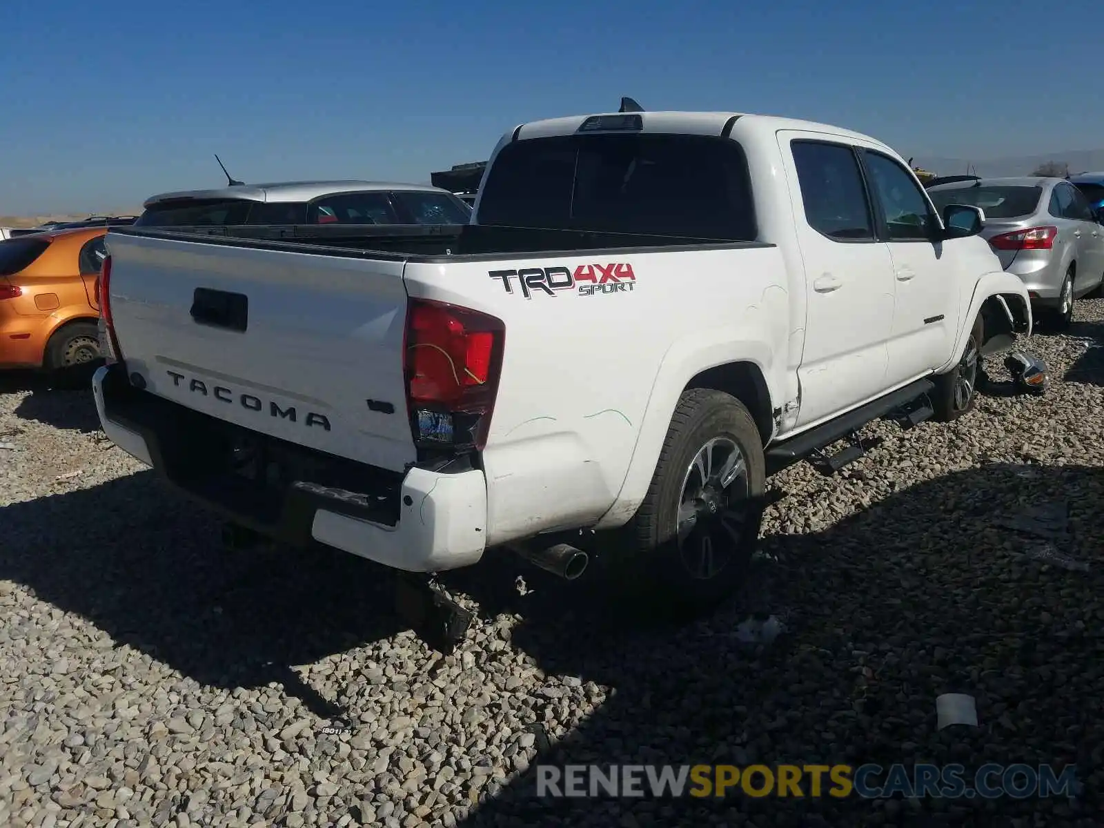 4 Photograph of a damaged car 3TMCZ5AN8KM240116 TOYOTA TACOMA 2019