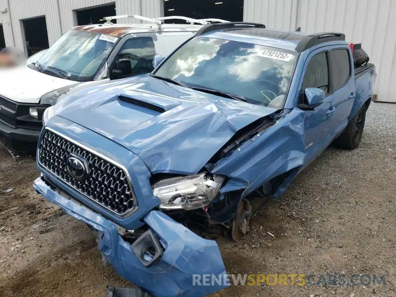 2 Photograph of a damaged car 3TMCZ5AN8KM241735 TOYOTA TACOMA 2019