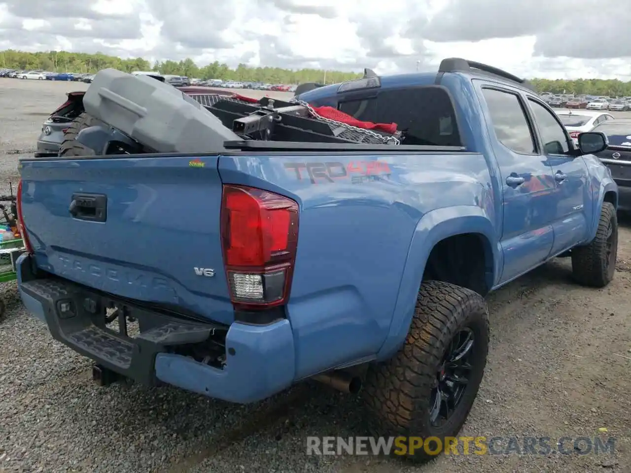 4 Photograph of a damaged car 3TMCZ5AN8KM241735 TOYOTA TACOMA 2019