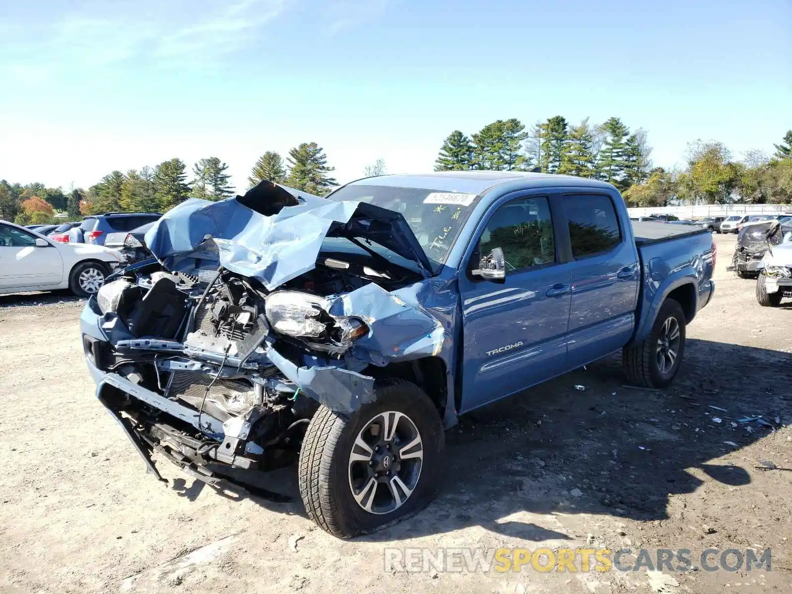 2 Photograph of a damaged car 3TMCZ5AN8KM243517 TOYOTA TACOMA 2019