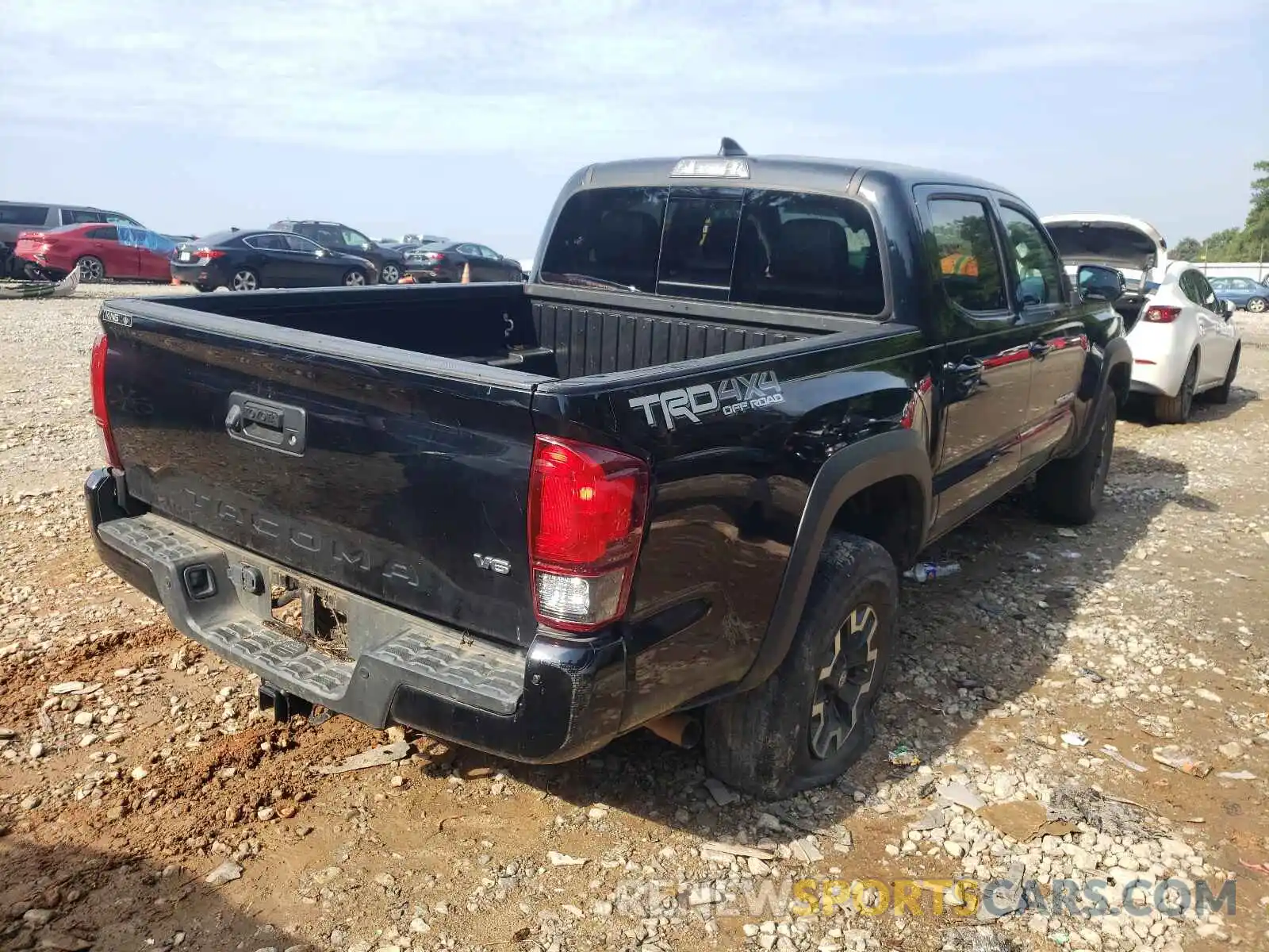 4 Photograph of a damaged car 3TMCZ5AN8KM245235 TOYOTA TACOMA 2019