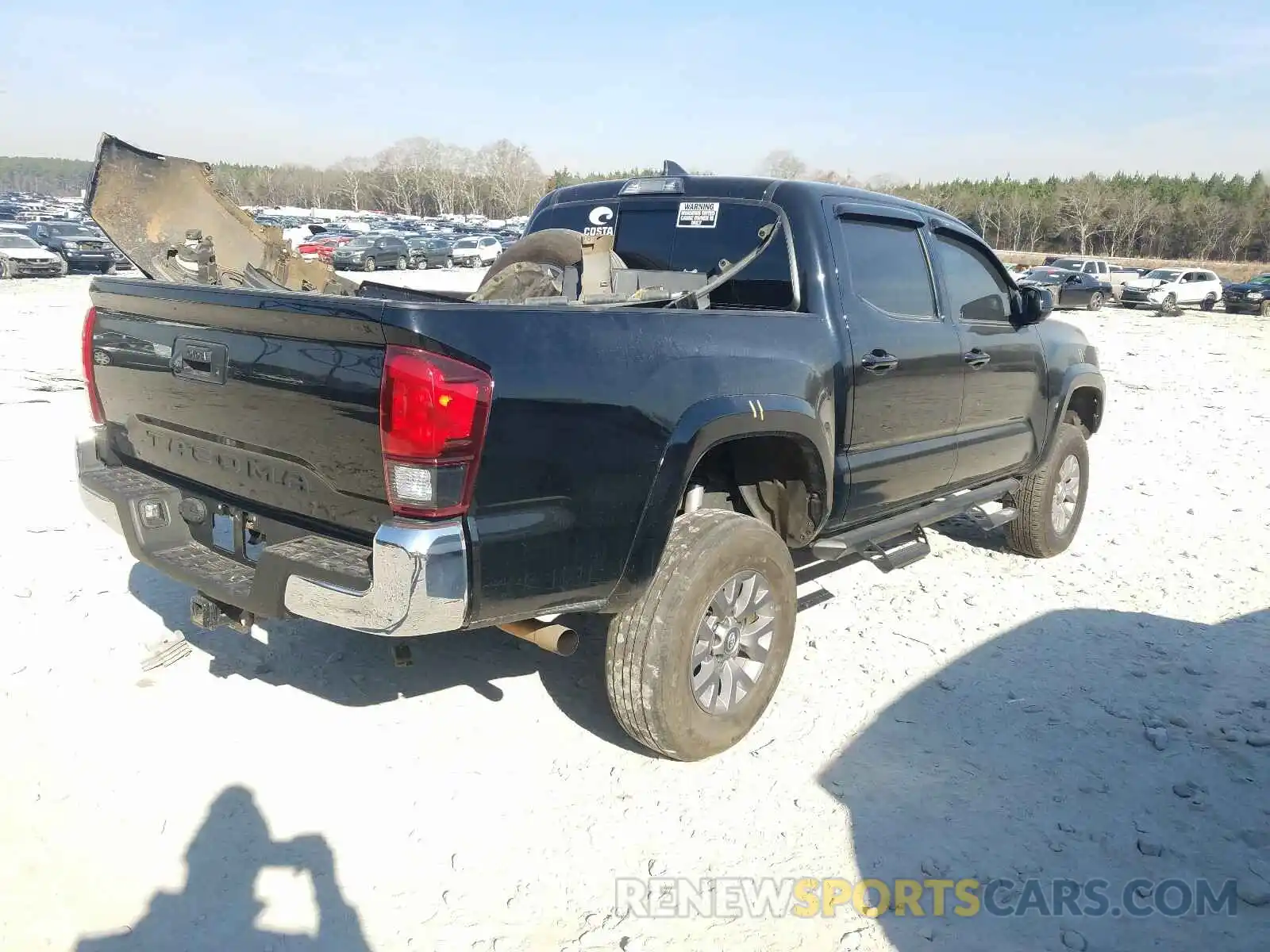 4 Photograph of a damaged car 3TMCZ5AN8KM249804 TOYOTA TACOMA 2019