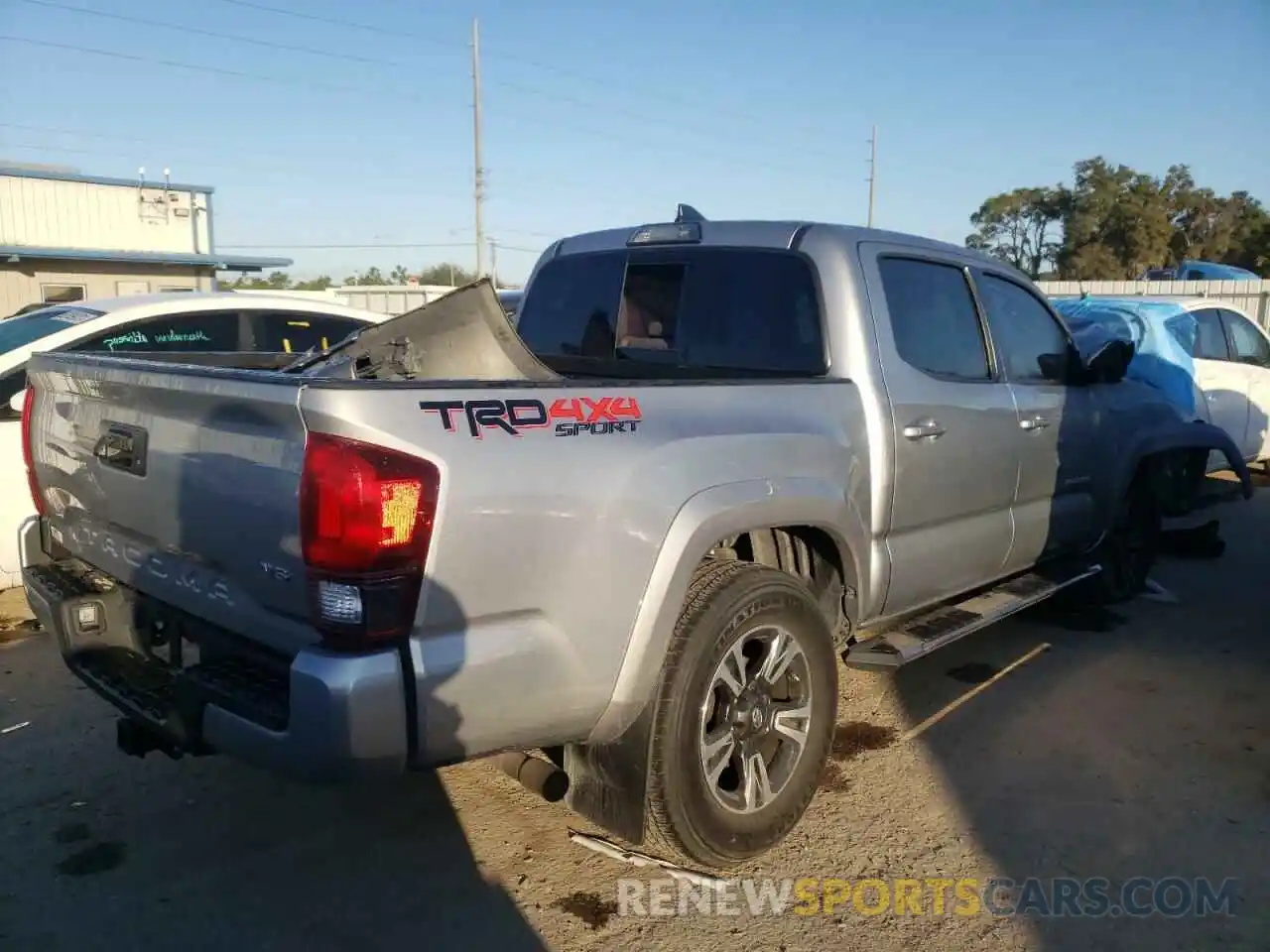 4 Photograph of a damaged car 3TMCZ5AN8KM258728 TOYOTA TACOMA 2019