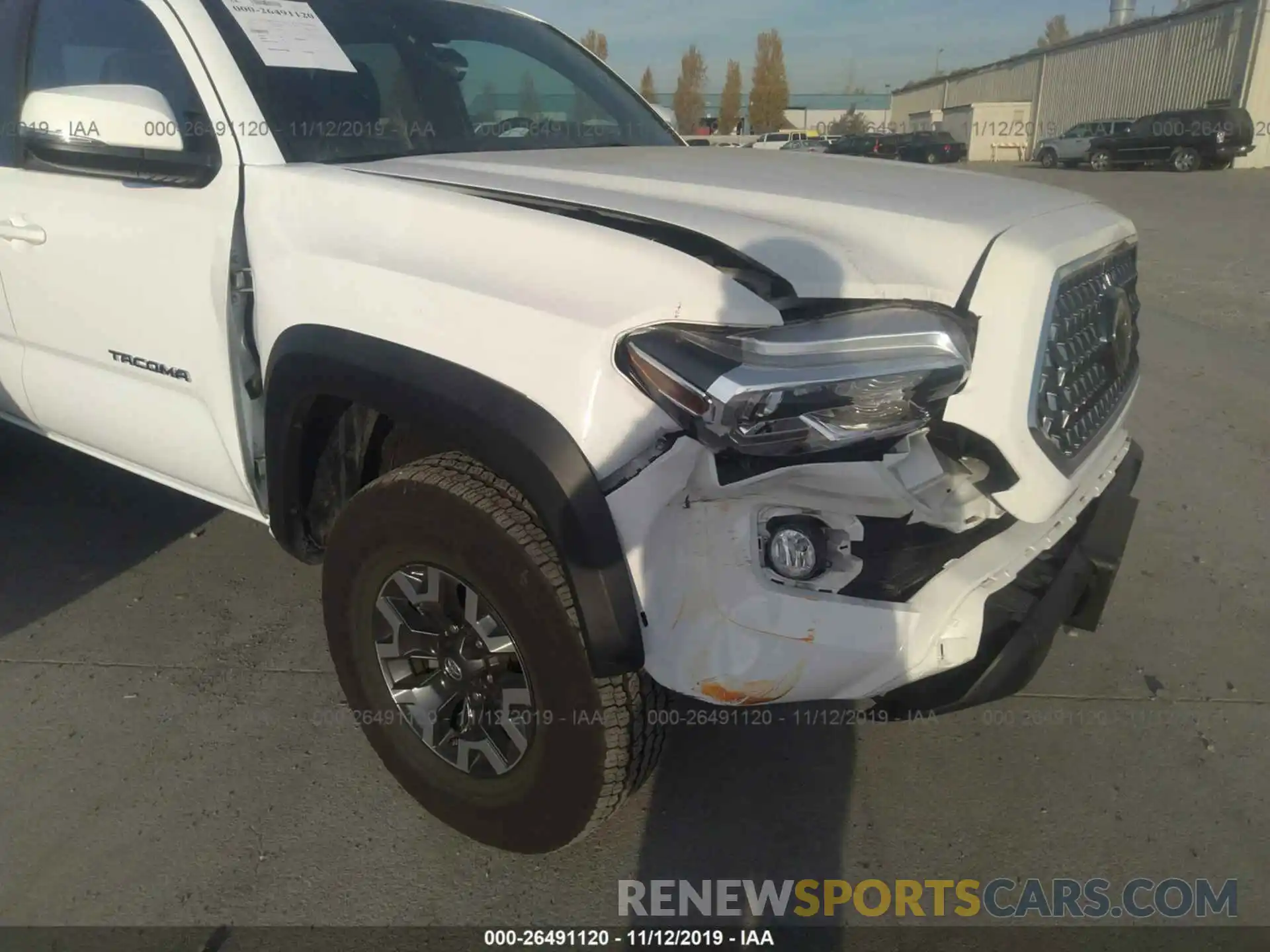 6 Photograph of a damaged car 3TMCZ5AN8KM259488 TOYOTA TACOMA 2019