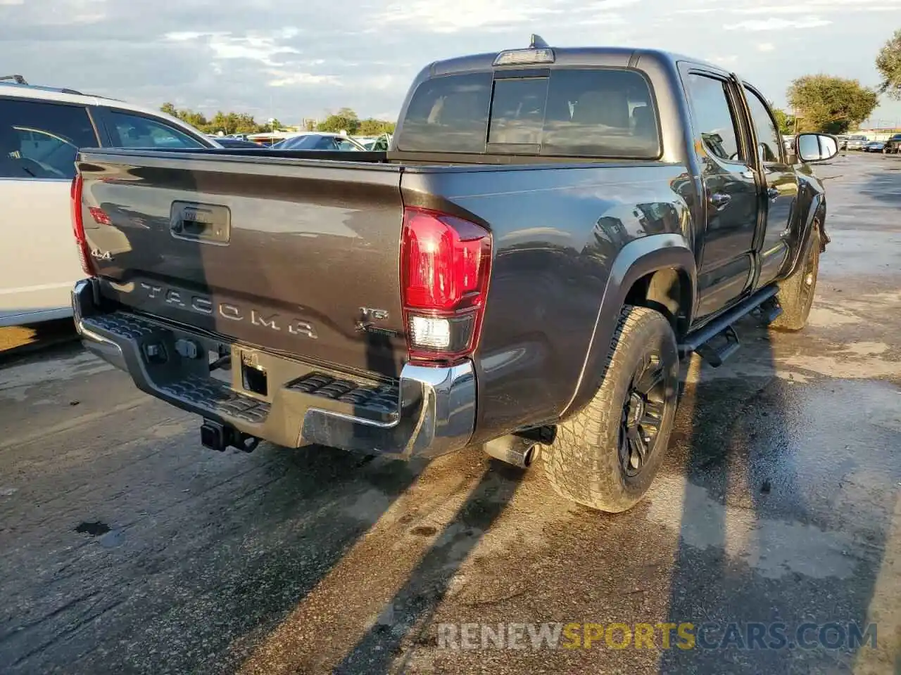 4 Photograph of a damaged car 3TMCZ5AN8KM263427 TOYOTA TACOMA 2019