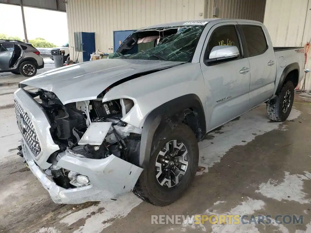 2 Photograph of a damaged car 3TMCZ5AN8KM267512 TOYOTA TACOMA 2019