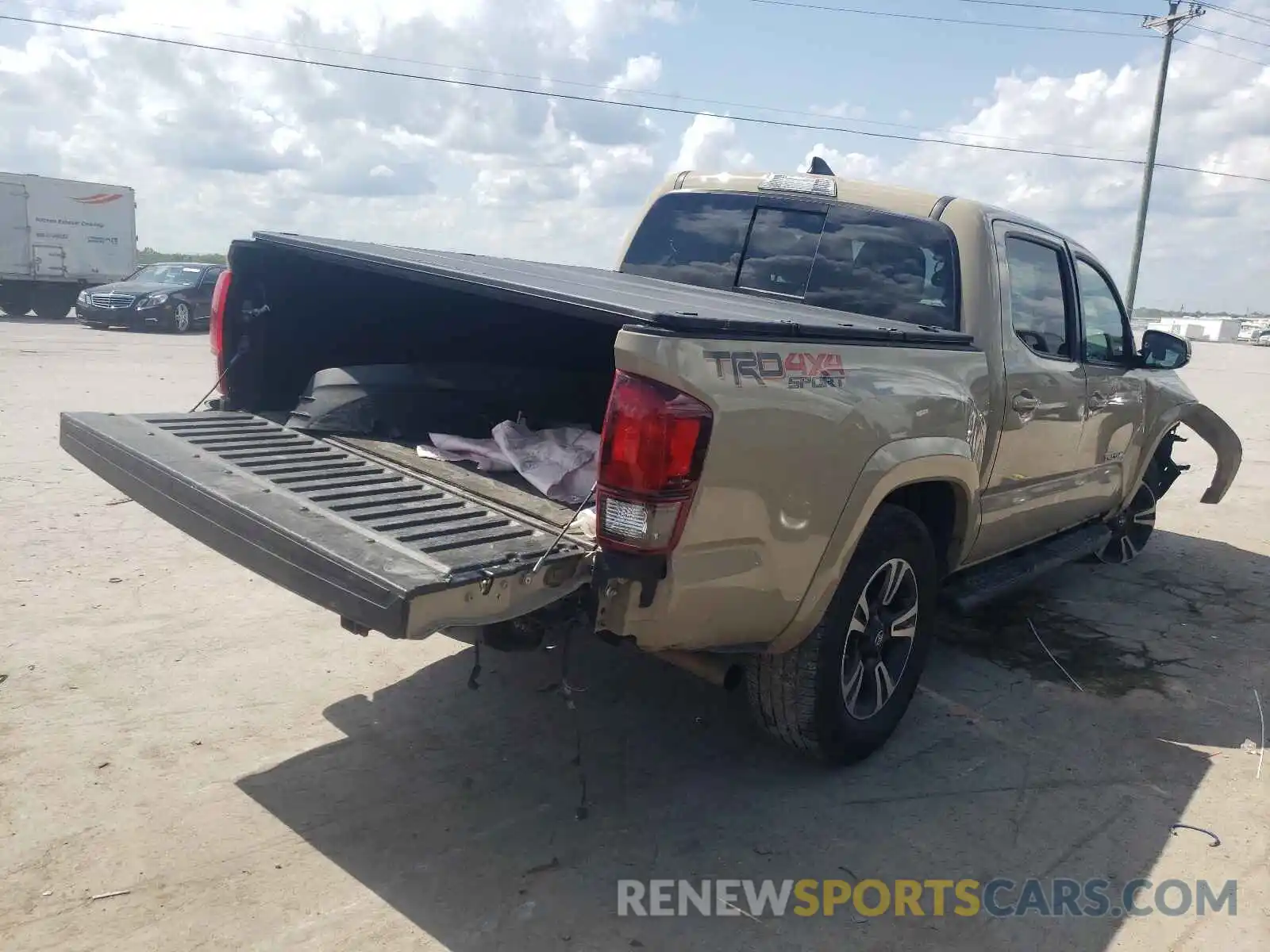 4 Photograph of a damaged car 3TMCZ5AN8KM268689 TOYOTA TACOMA 2019