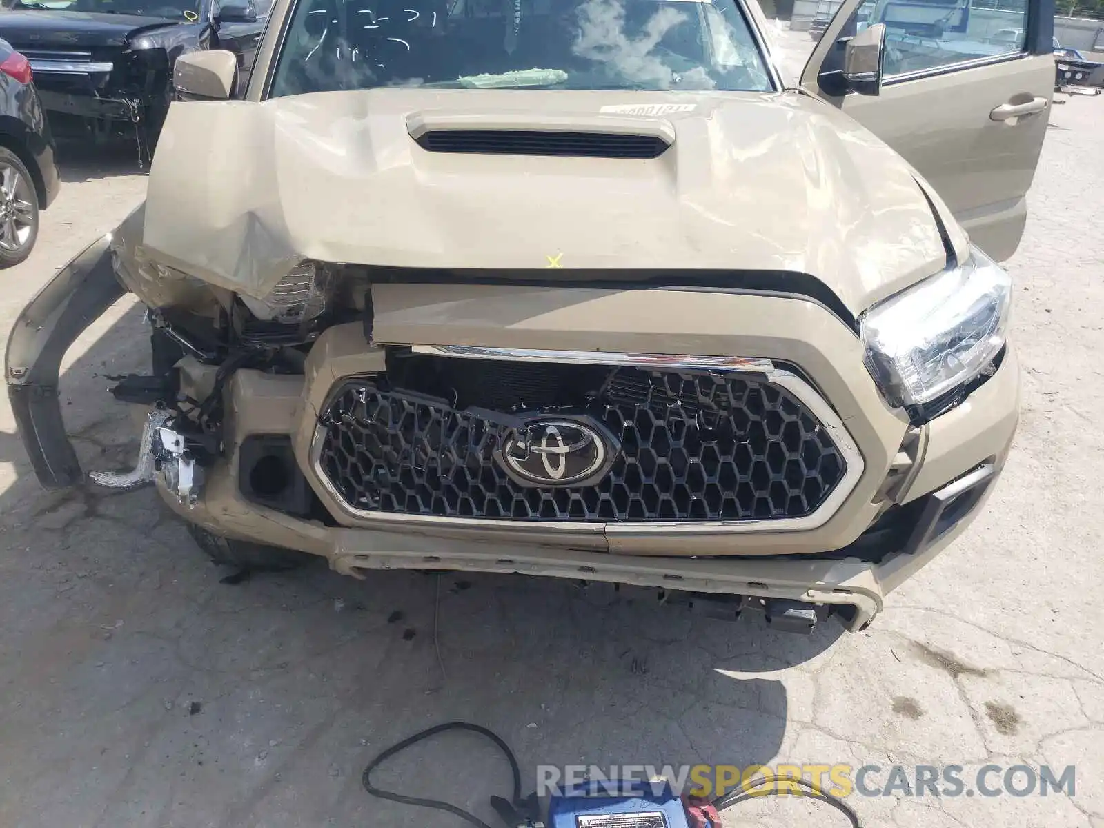 7 Photograph of a damaged car 3TMCZ5AN8KM268689 TOYOTA TACOMA 2019