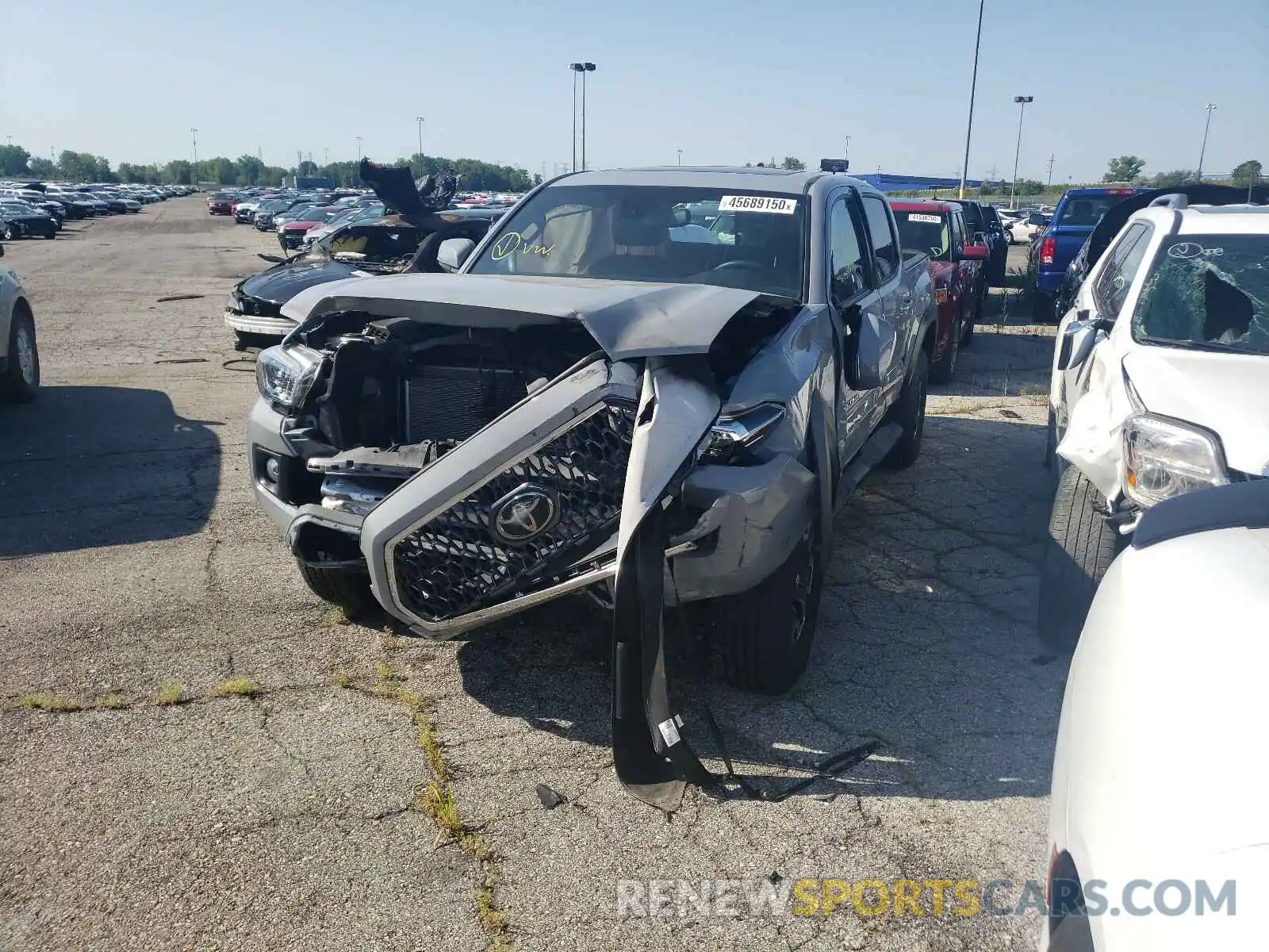 2 Photograph of a damaged car 3TMCZ5AN8KM273326 TOYOTA TACOMA 2019