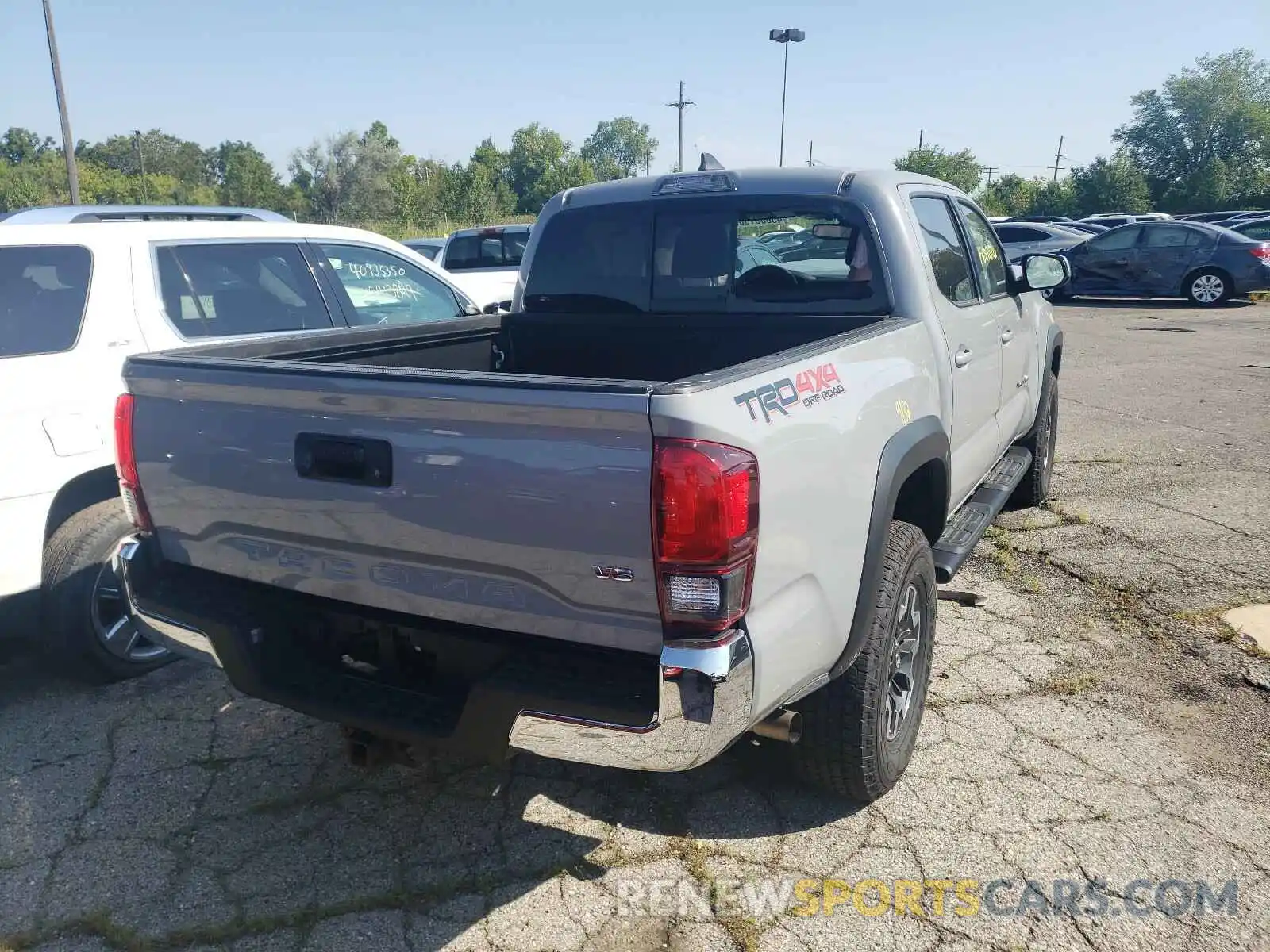 4 Photograph of a damaged car 3TMCZ5AN8KM273326 TOYOTA TACOMA 2019