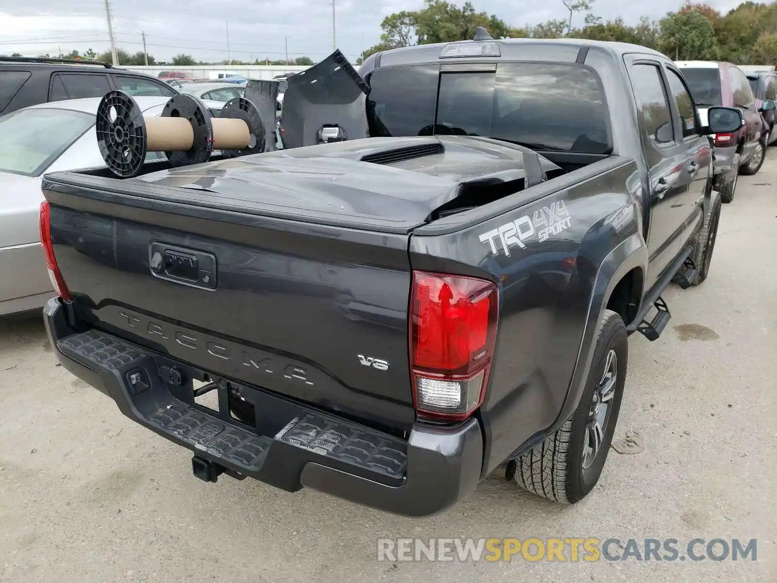 4 Photograph of a damaged car 3TMCZ5AN8KM278428 TOYOTA TACOMA 2019