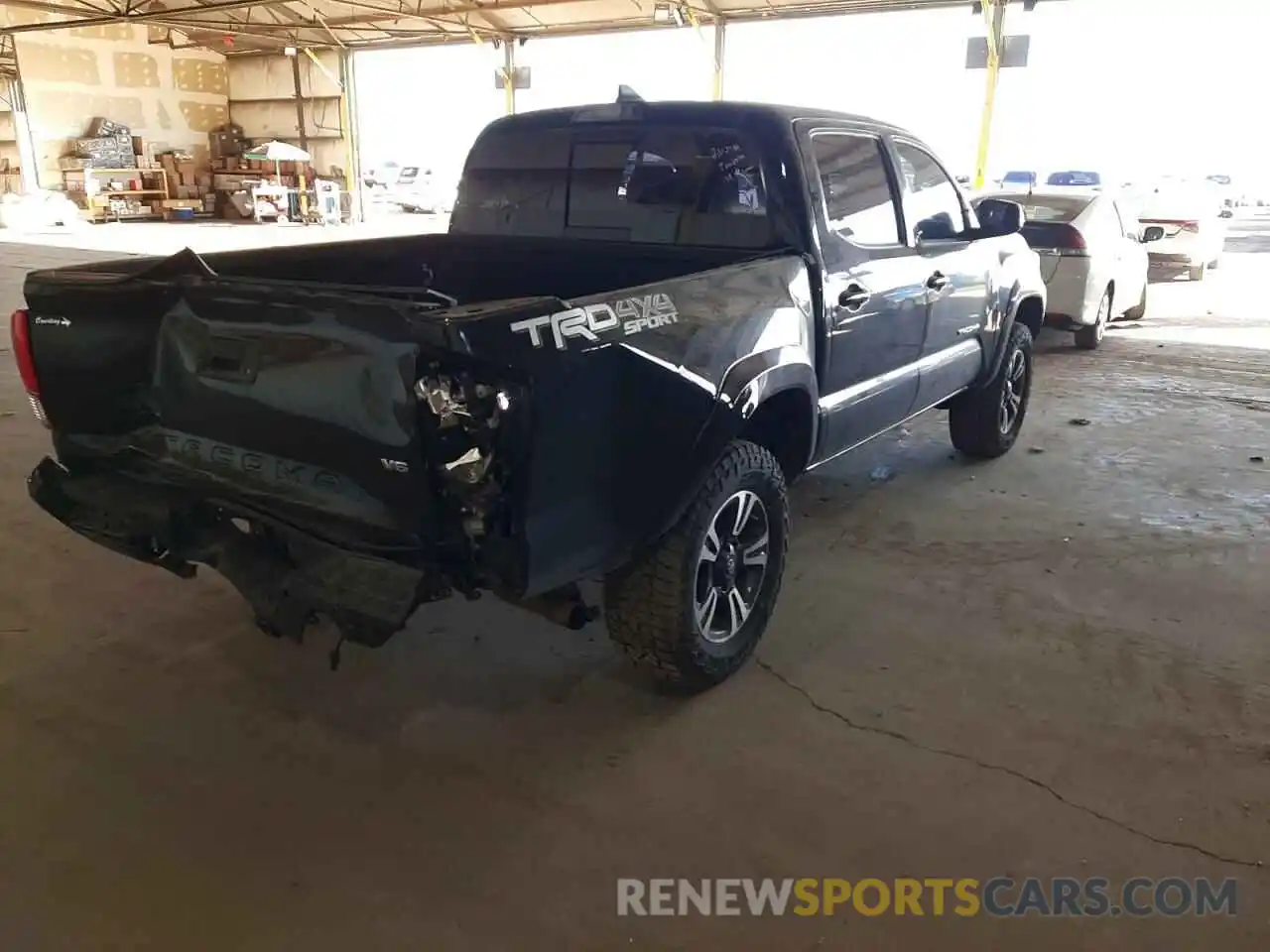 4 Photograph of a damaged car 3TMCZ5AN8KM281331 TOYOTA TACOMA 2019