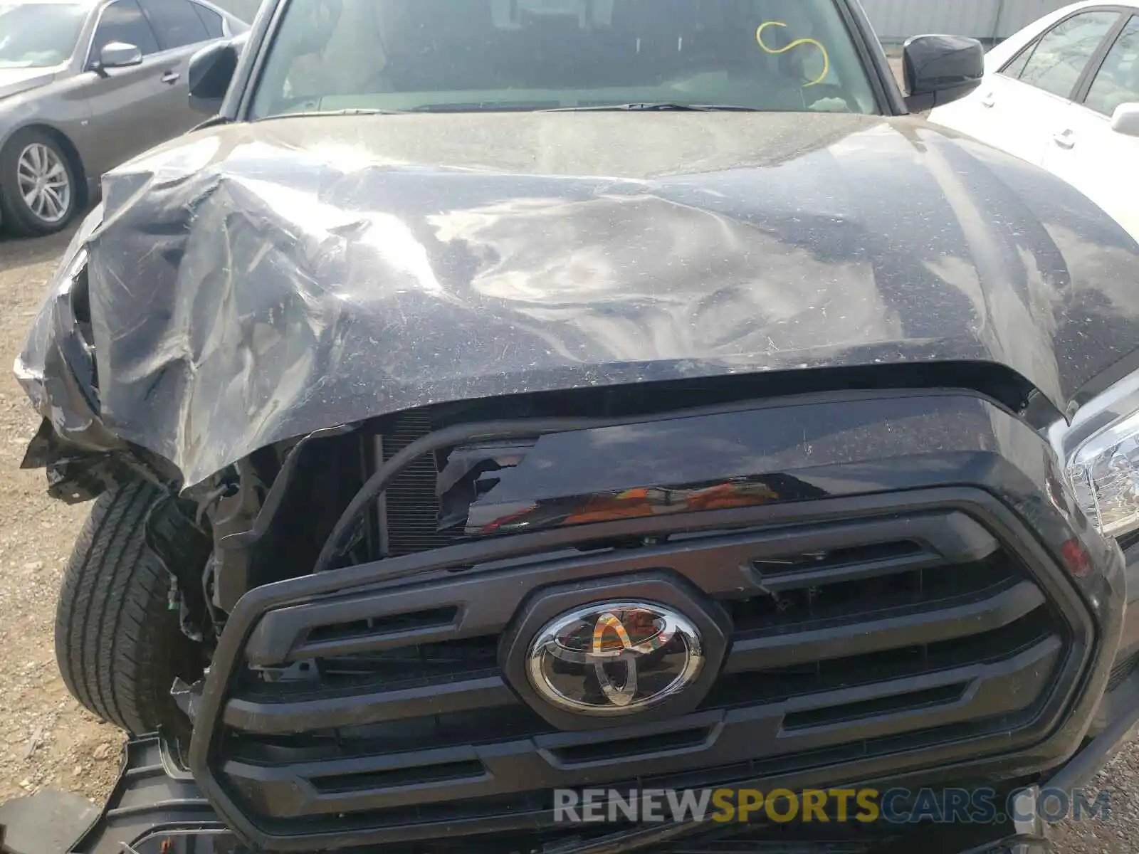 7 Photograph of a damaged car 3TMCZ5AN8KM281524 TOYOTA TACOMA 2019