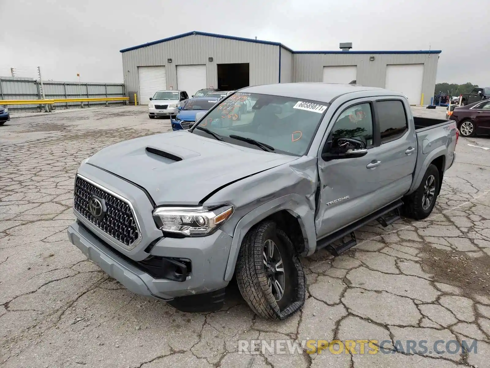 2 Photograph of a damaged car 3TMCZ5AN8KM282950 TOYOTA TACOMA 2019