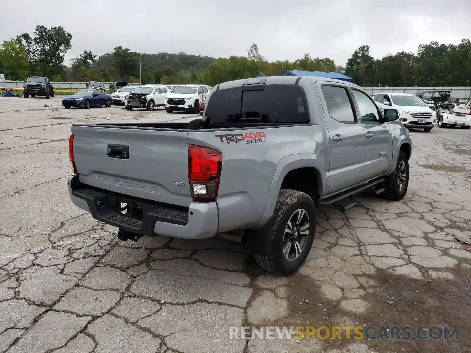 4 Photograph of a damaged car 3TMCZ5AN8KM282950 TOYOTA TACOMA 2019