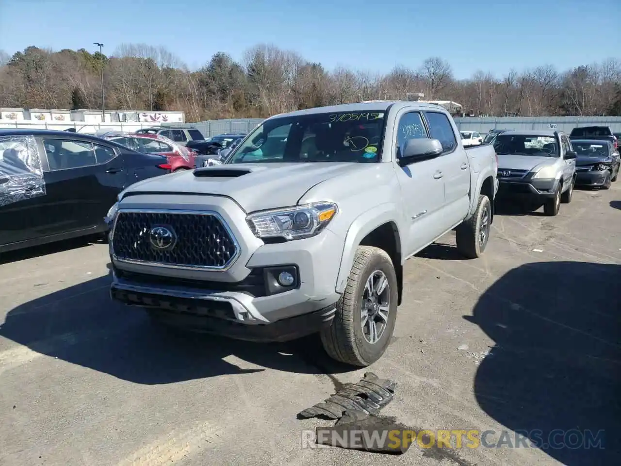 2 Photograph of a damaged car 3TMCZ5AN8KM283189 TOYOTA TACOMA 2019