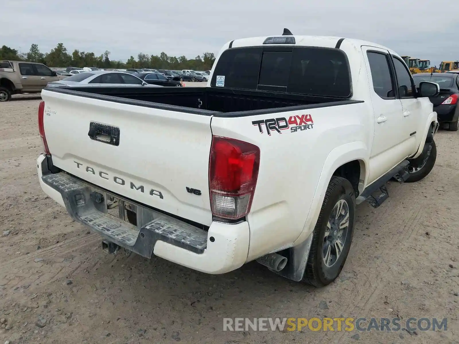 4 Photograph of a damaged car 3TMCZ5AN8KM285962 TOYOTA TACOMA 2019