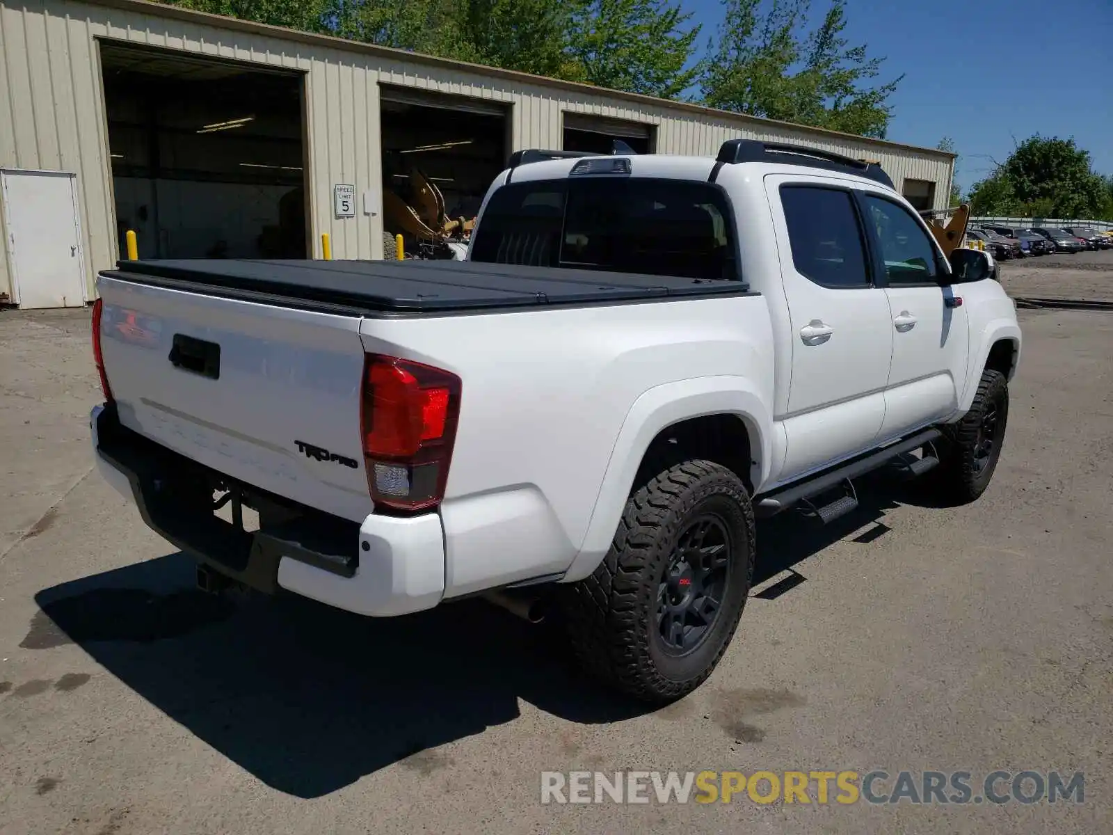 4 Photograph of a damaged car 3TMCZ5AN9KM195042 TOYOTA TACOMA 2019