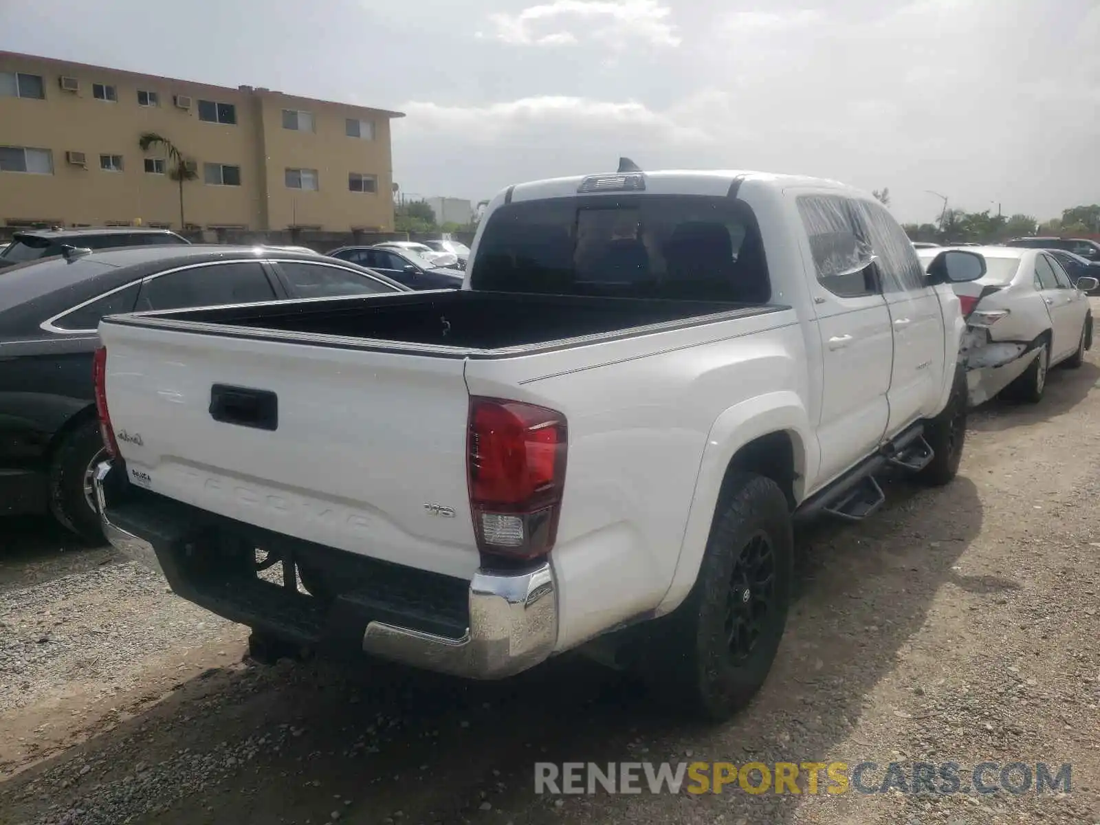 4 Photograph of a damaged car 3TMCZ5AN9KM196871 TOYOTA TACOMA 2019