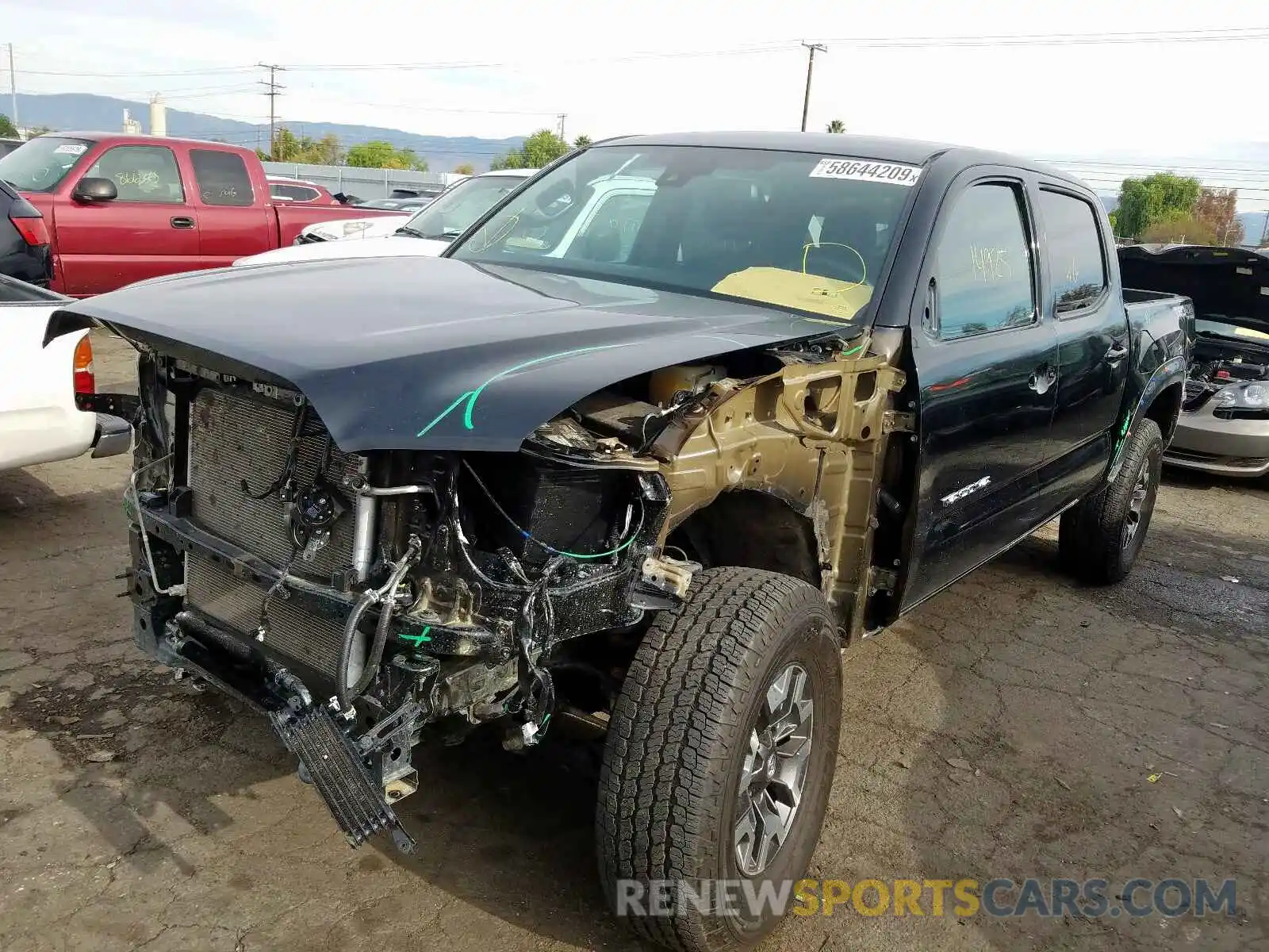 2 Photograph of a damaged car 3TMCZ5AN9KM197096 TOYOTA TACOMA 2019