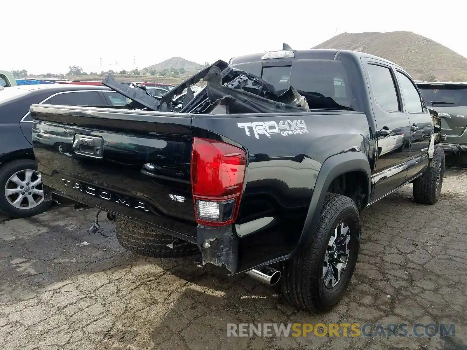 4 Photograph of a damaged car 3TMCZ5AN9KM197096 TOYOTA TACOMA 2019