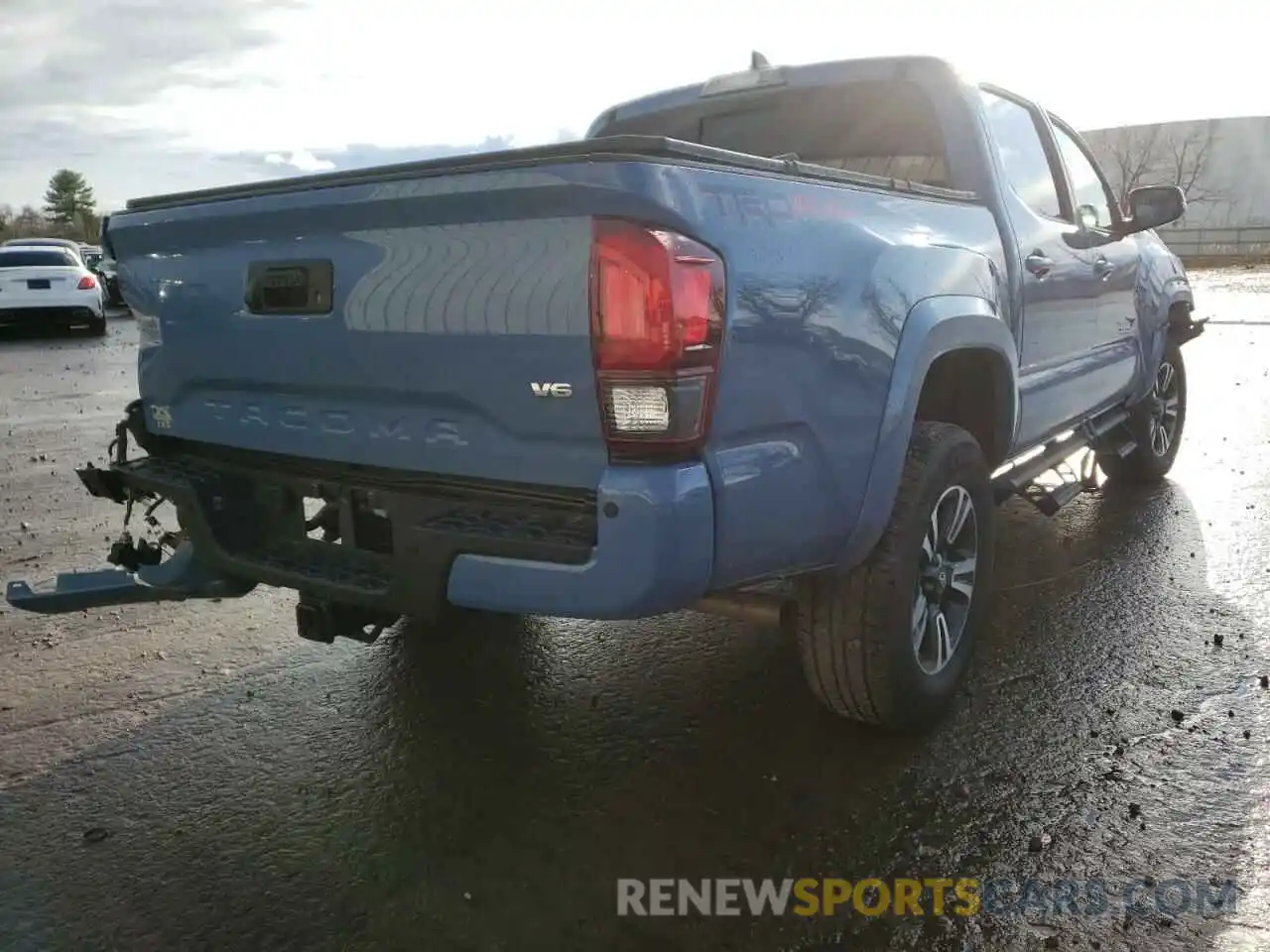 4 Photograph of a damaged car 3TMCZ5AN9KM198698 TOYOTA TACOMA 2019