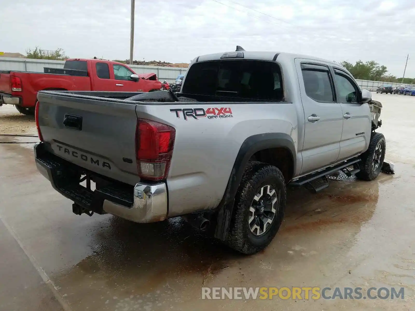 4 Photograph of a damaged car 3TMCZ5AN9KM199253 TOYOTA TACOMA 2019