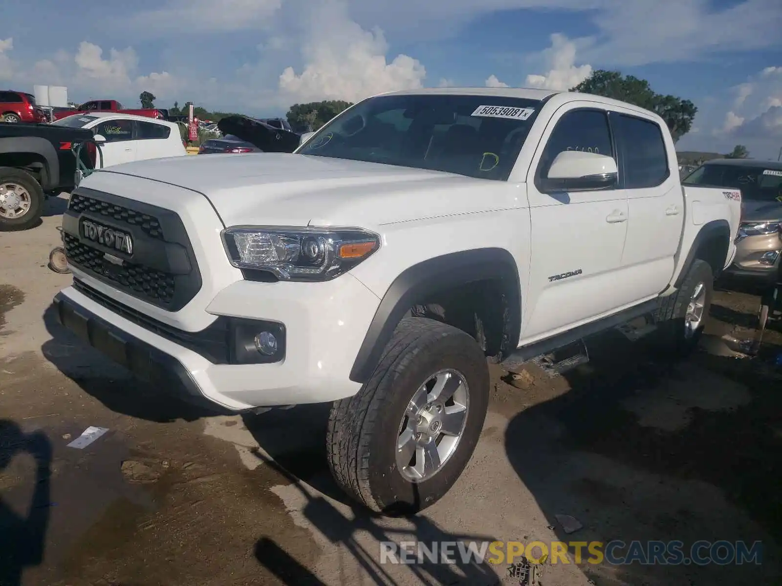 2 Photograph of a damaged car 3TMCZ5AN9KM199589 TOYOTA TACOMA 2019