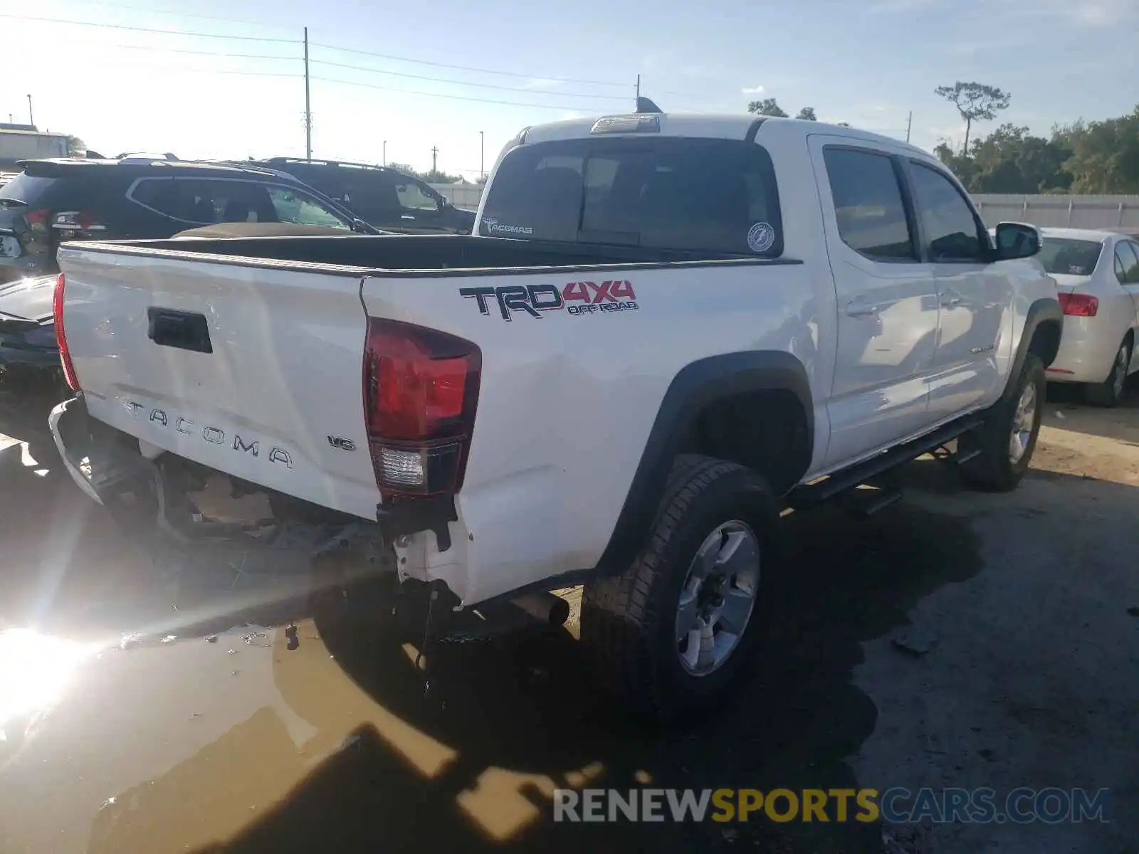 4 Photograph of a damaged car 3TMCZ5AN9KM199589 TOYOTA TACOMA 2019