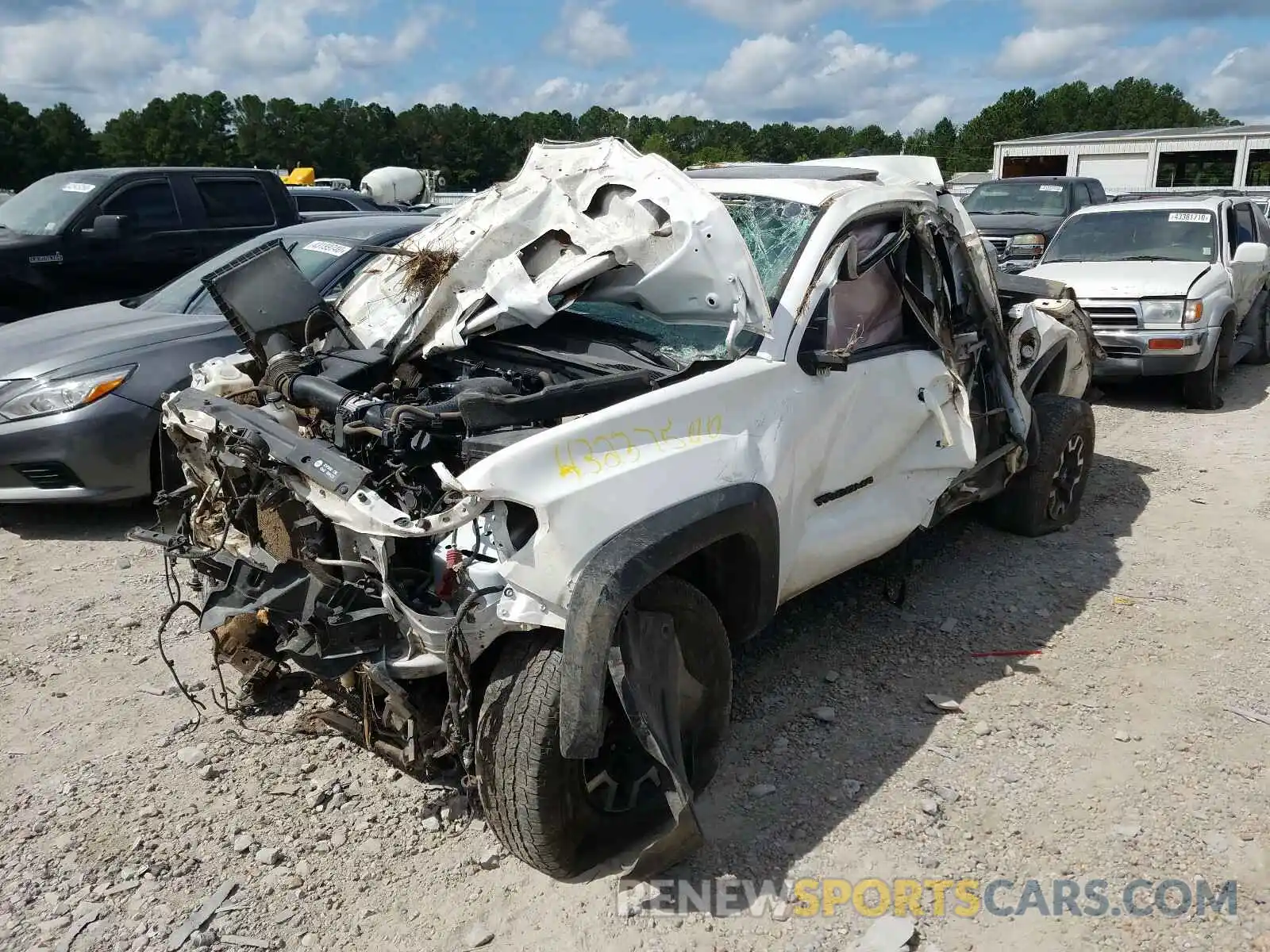 2 Photograph of a damaged car 3TMCZ5AN9KM200076 TOYOTA TACOMA 2019