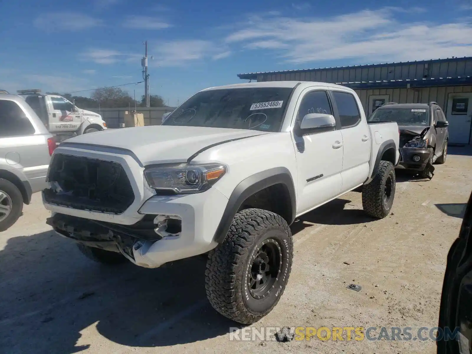 2 Photograph of a damaged car 3TMCZ5AN9KM201941 TOYOTA TACOMA 2019