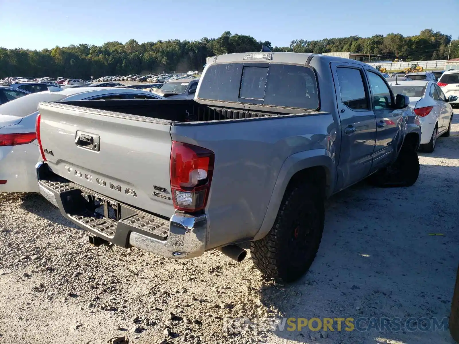 4 Photograph of a damaged car 3TMCZ5AN9KM203253 TOYOTA TACOMA 2019