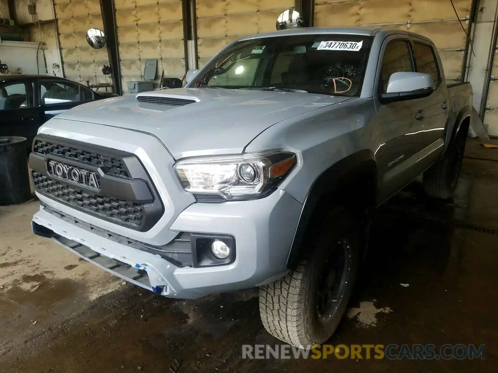 2 Photograph of a damaged car 3TMCZ5AN9KM204063 TOYOTA TACOMA 2019