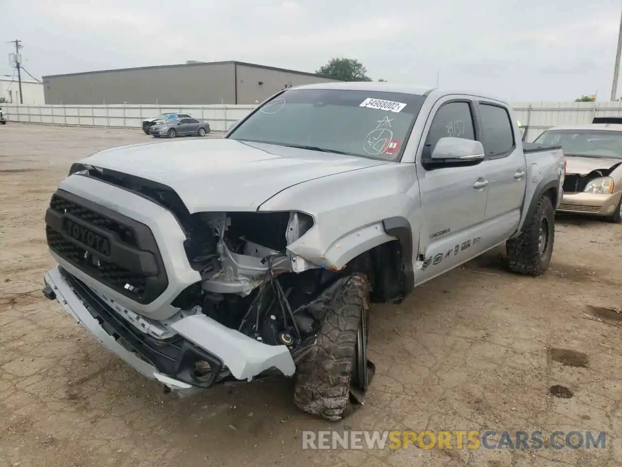 2 Photograph of a damaged car 3TMCZ5AN9KM207710 TOYOTA TACOMA 2019